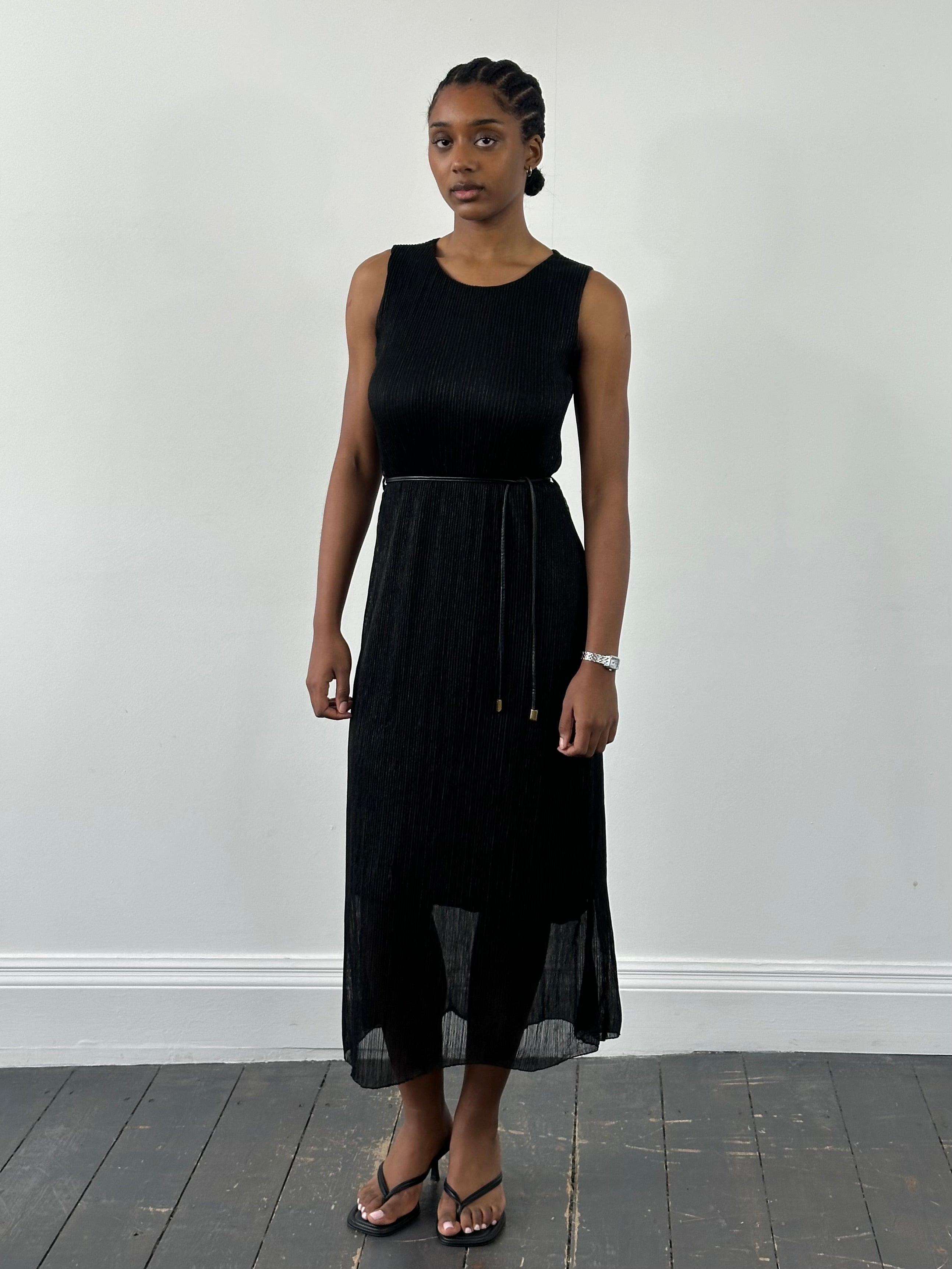 Vintage 1990s Italian ribbed metallic rope tie dress, navy blue, sleeveless, form-fitting with a stylish retro design.