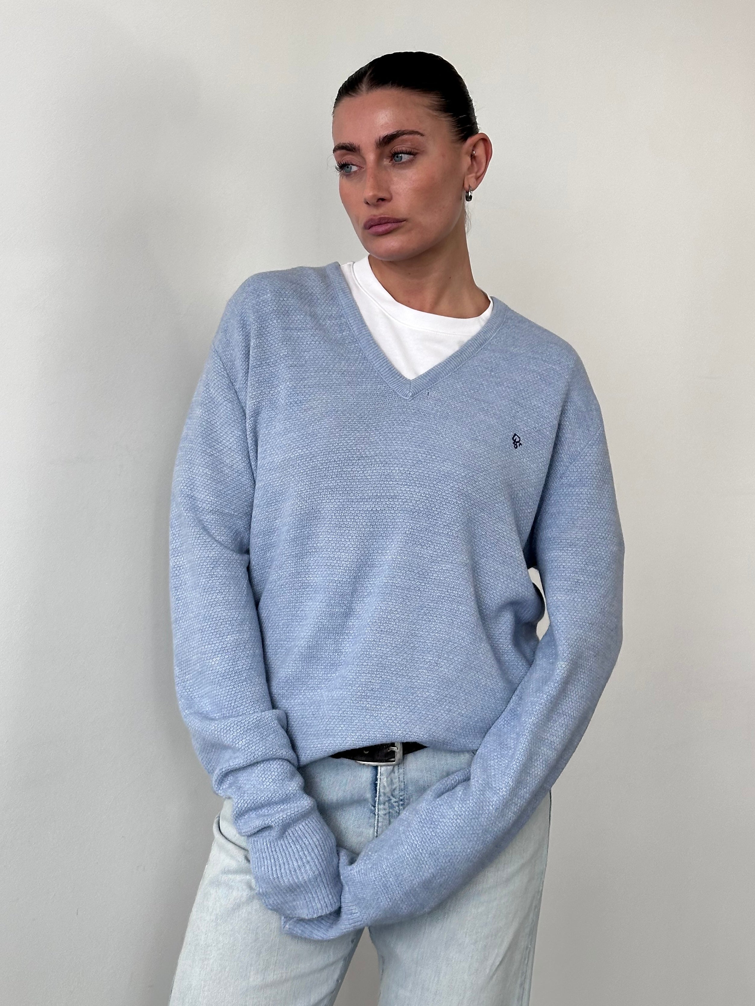 Christian Dior Monsieur V neck logo knitted jumper in size L/XL, featuring a classic V neckline and Dior branding.