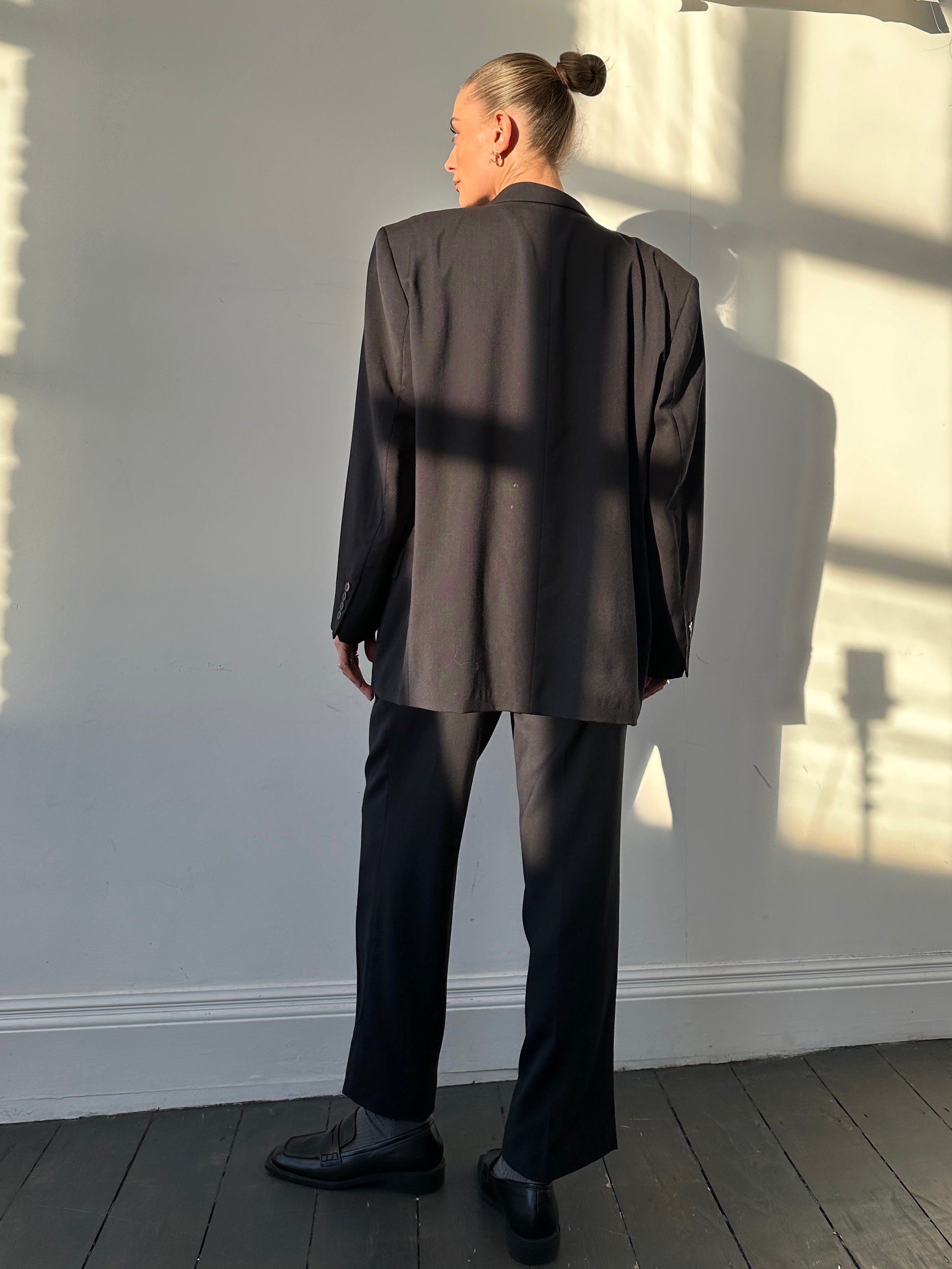 Pierre Cardin pure wool single-breasted suit jumpsuit in size 44S/W32, tailored fit with classic lapel details and smooth fabric.