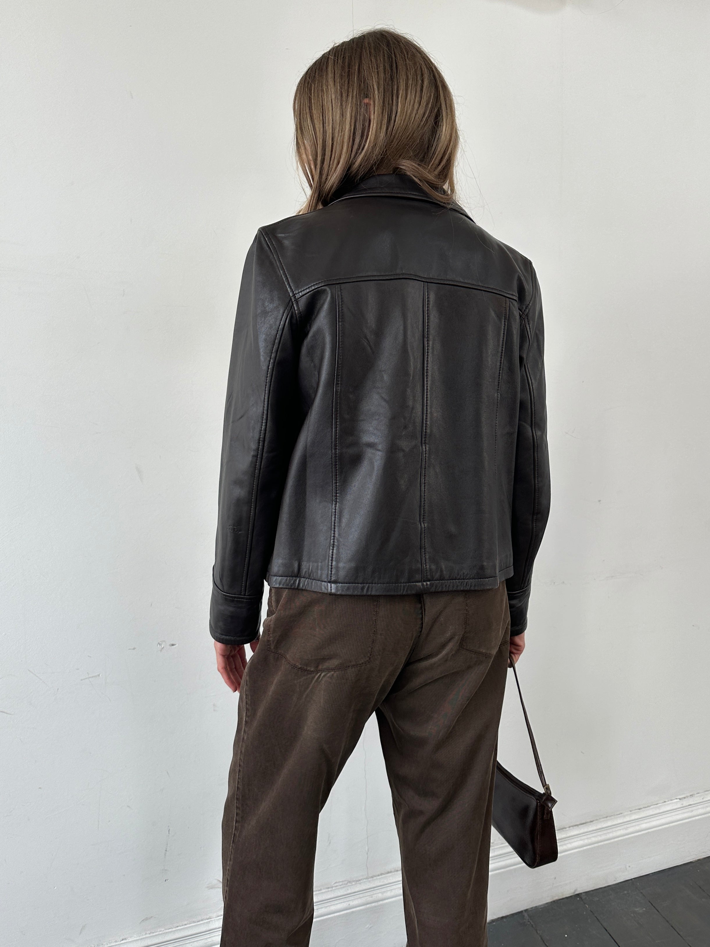 Conbipel men's button-up leather jacket in size S with classic collar and zip closure, black leather exterior.