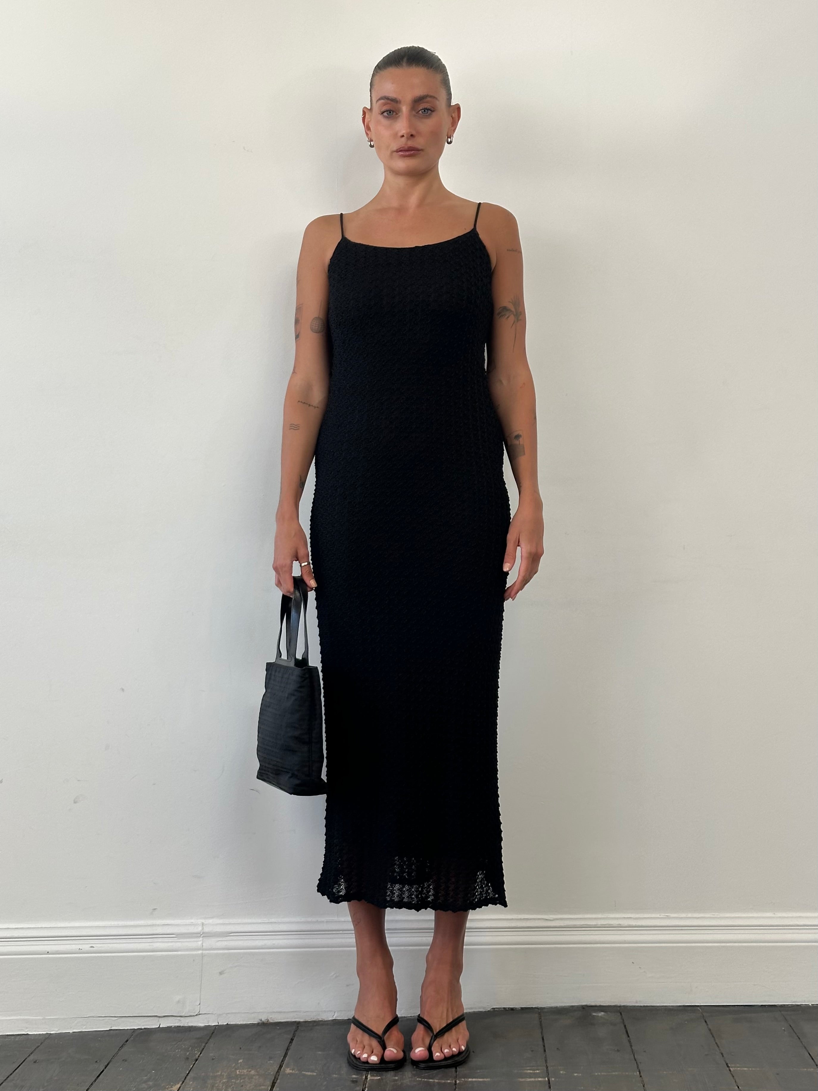 American Vintage textured maxi dress in size S, featuring a flowing fabric and stylish design, perfect for casual or dressy occasions.