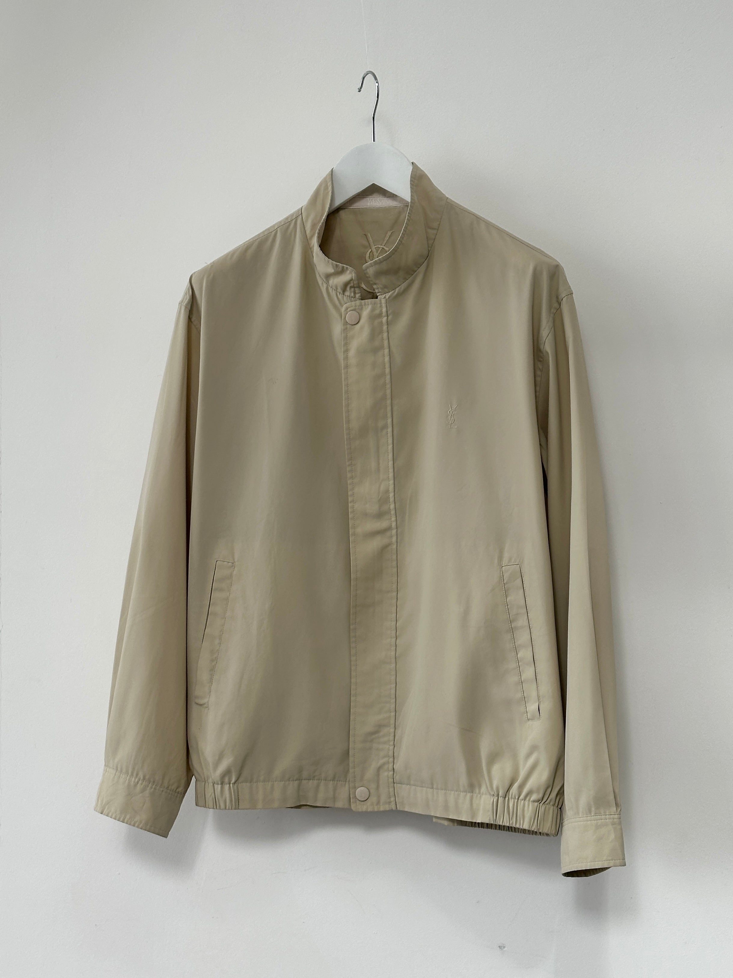 Yves Saint Laurent Pour Homme black logo bomber jacket with ribbed cuffs and collar, front zipper, and YSL branding.