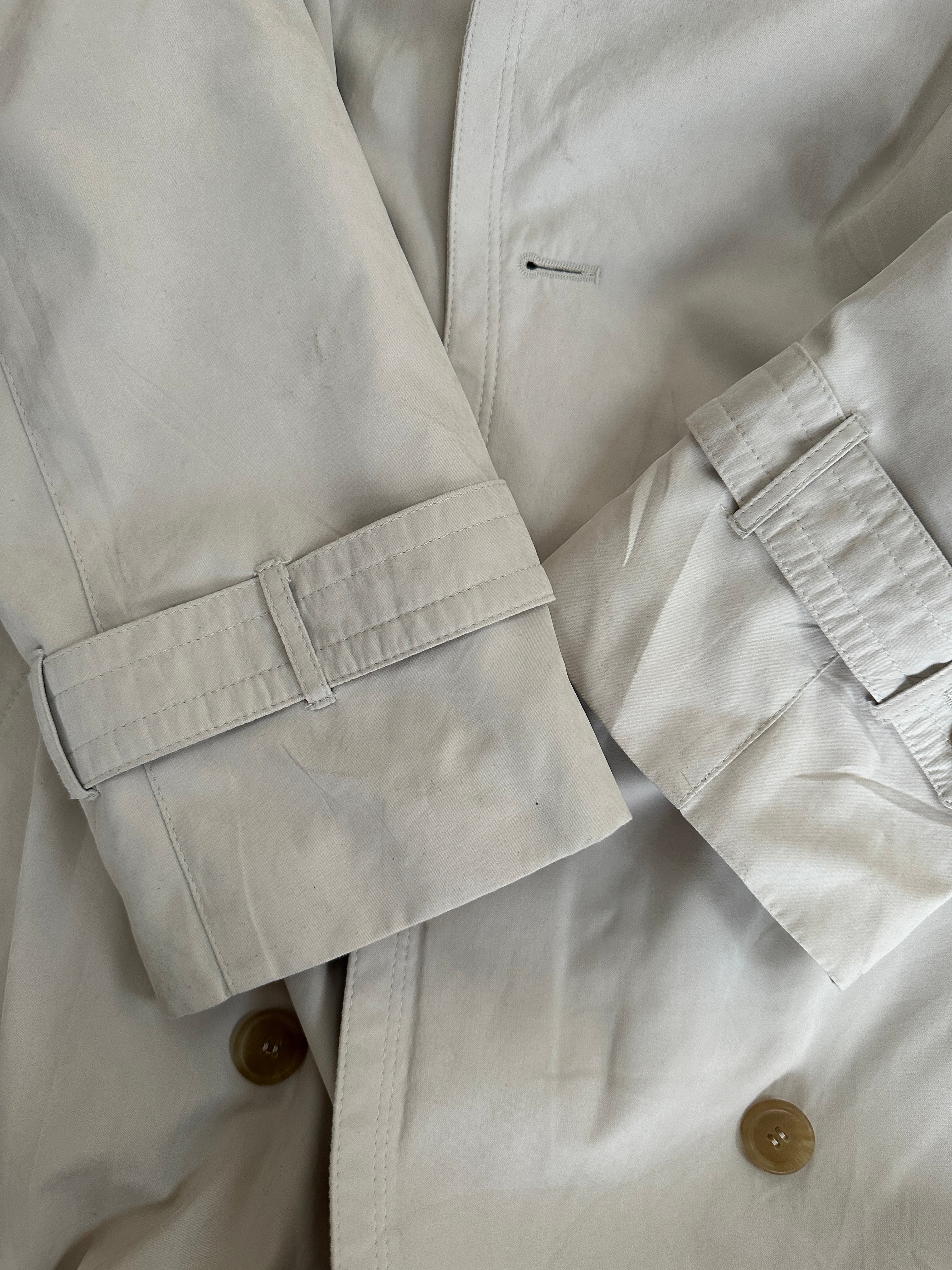 Vintage floor-length trench coat in size large, showcasing classic double-breasted design and timeless style.