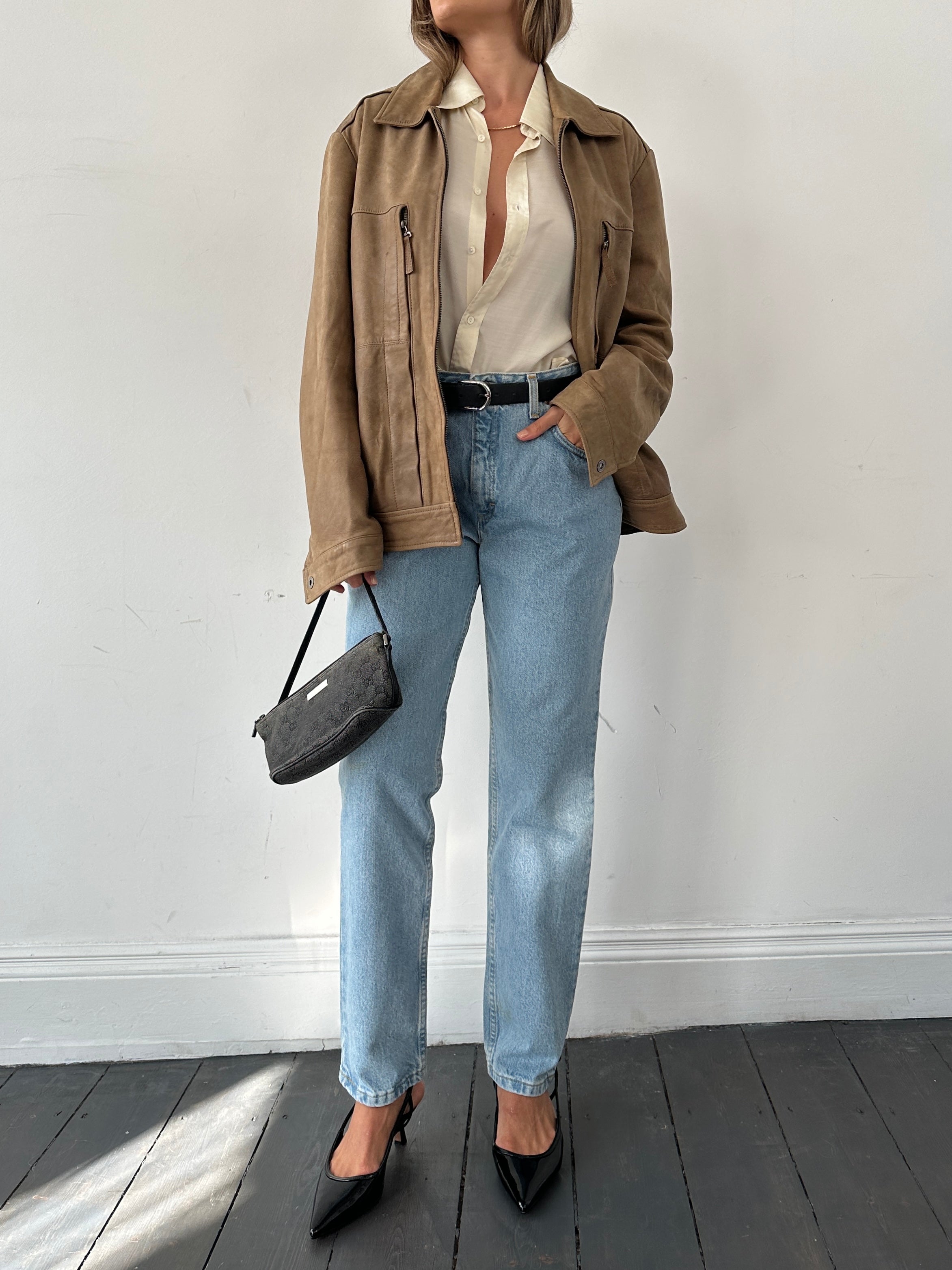 Light wash Lee high waisted denim jeans with W30 fit, displayed on a plain background.