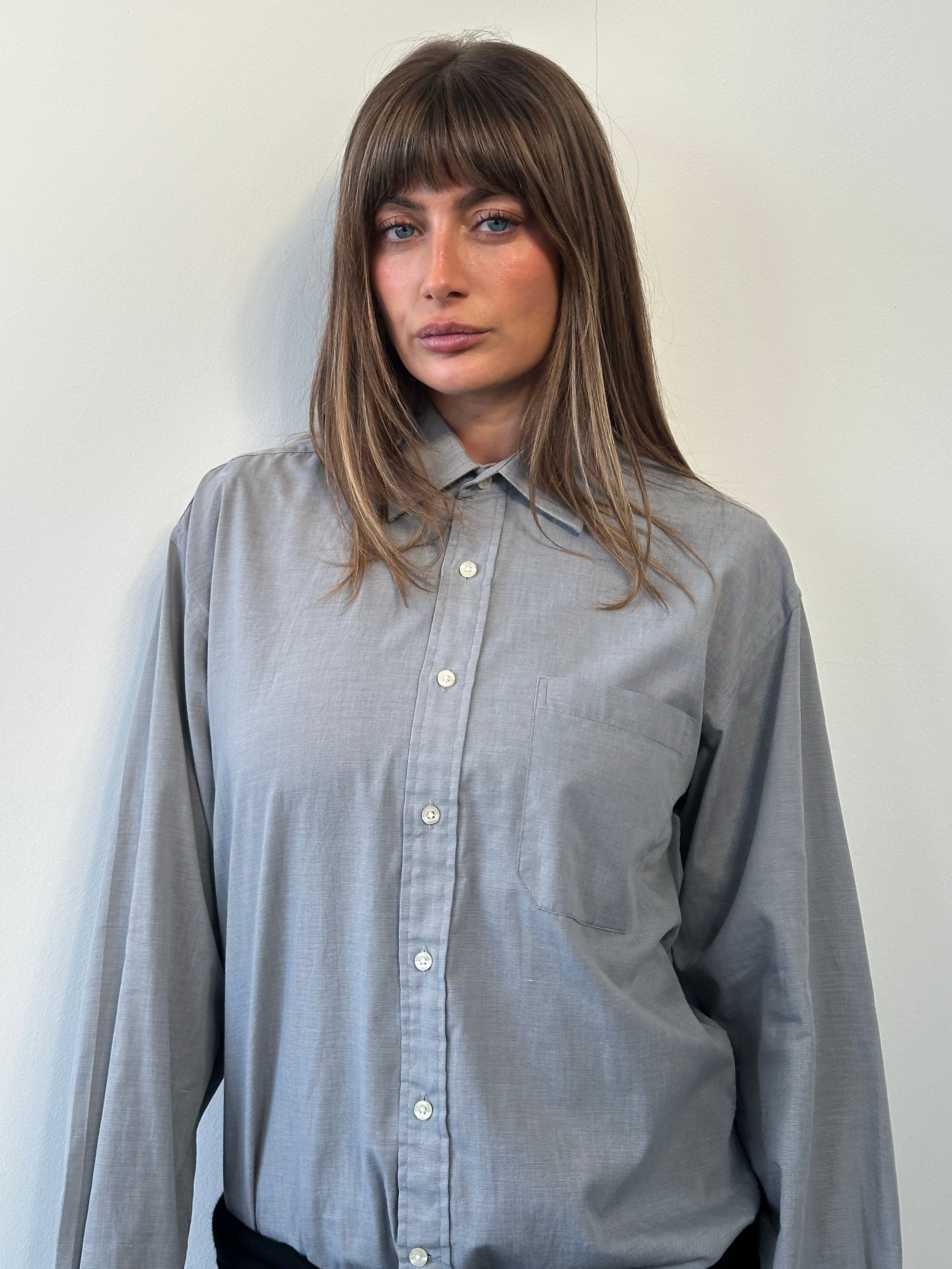 Christian Dior 1980s cotton shirt in size L/XL, featuring classic design with button-down front and elegant fabric details.