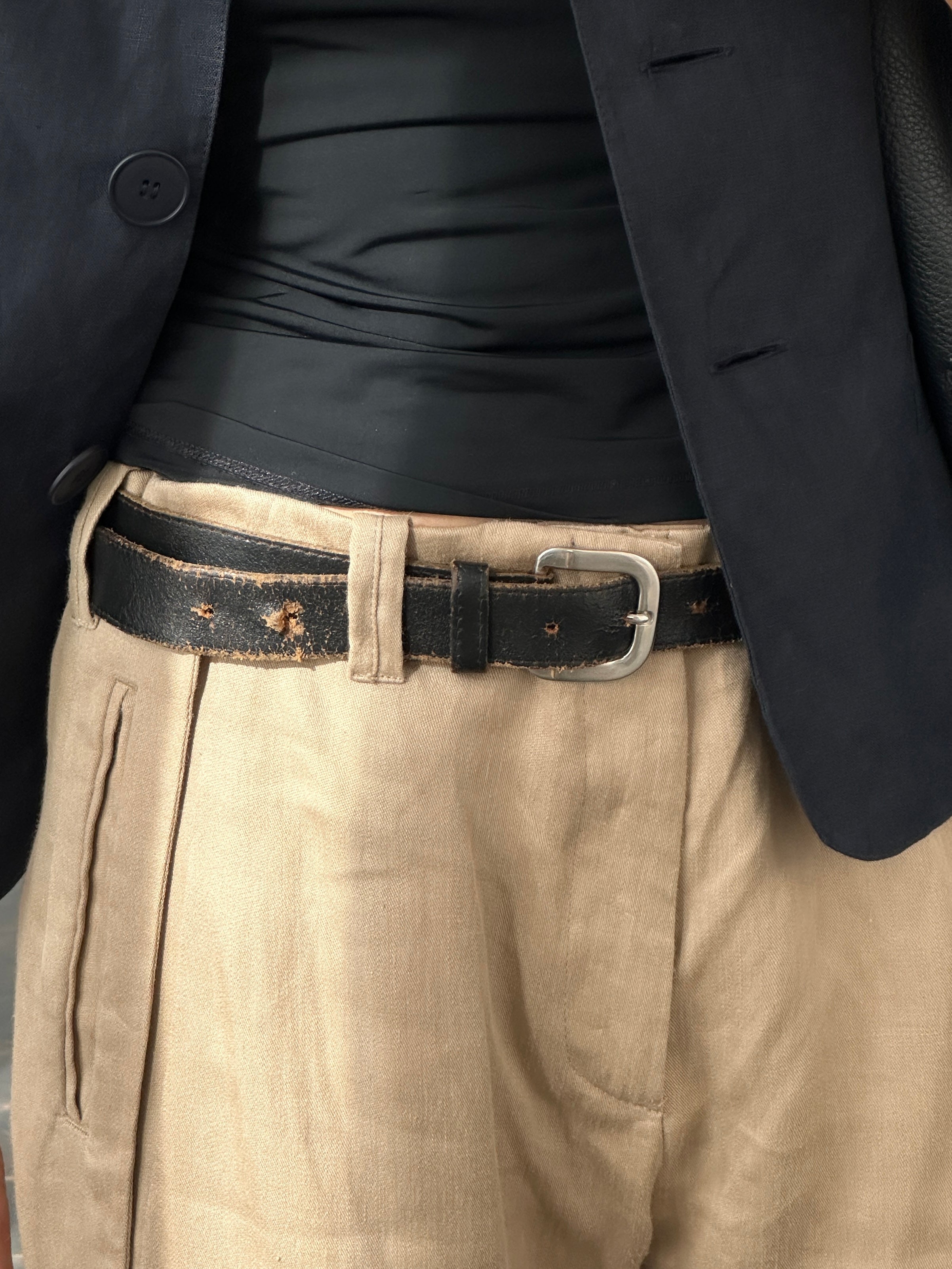 Vintage 1980s chrome distressed leather belt with adjustable W30-38, showcasing a retro style and aged metallic finish.