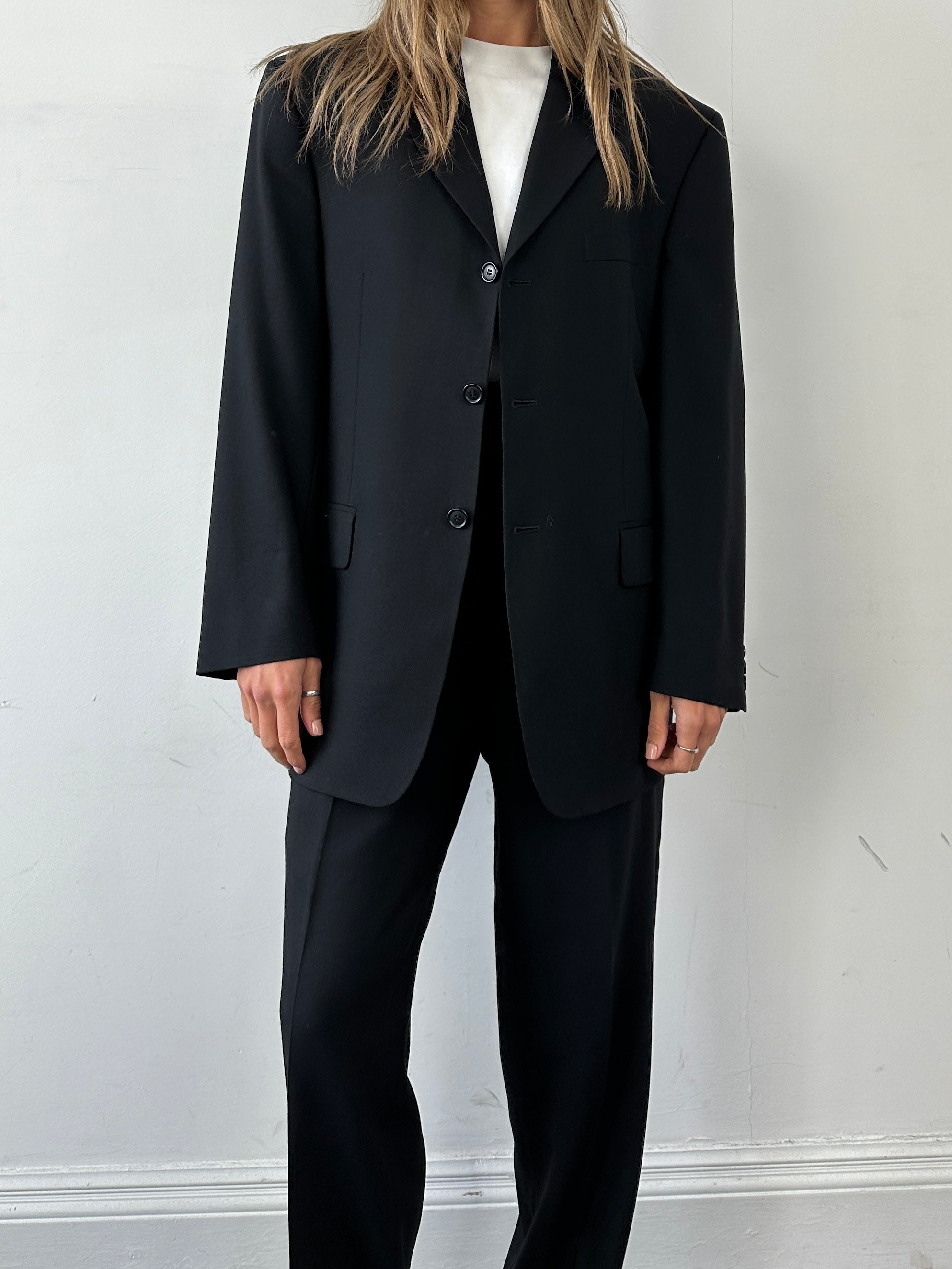 Pierre Cardin pure wool single-breasted suit jumpsuit in size 40R/W34, tailored fit with lapel collar and button closure.
