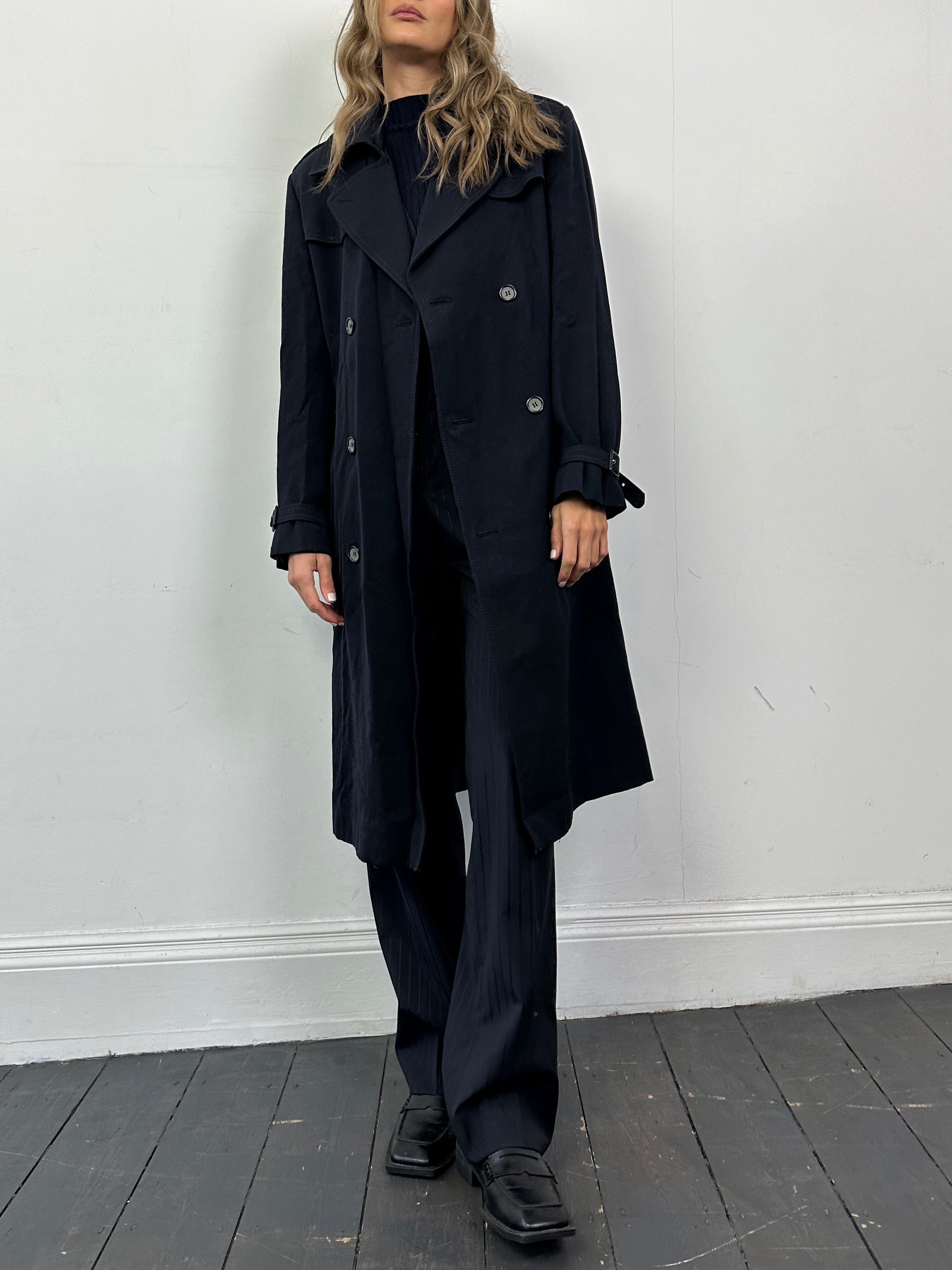Vintage wool double-breasted belted trench coat in size S, classic style with lapels and button details, displayed on a hanger.