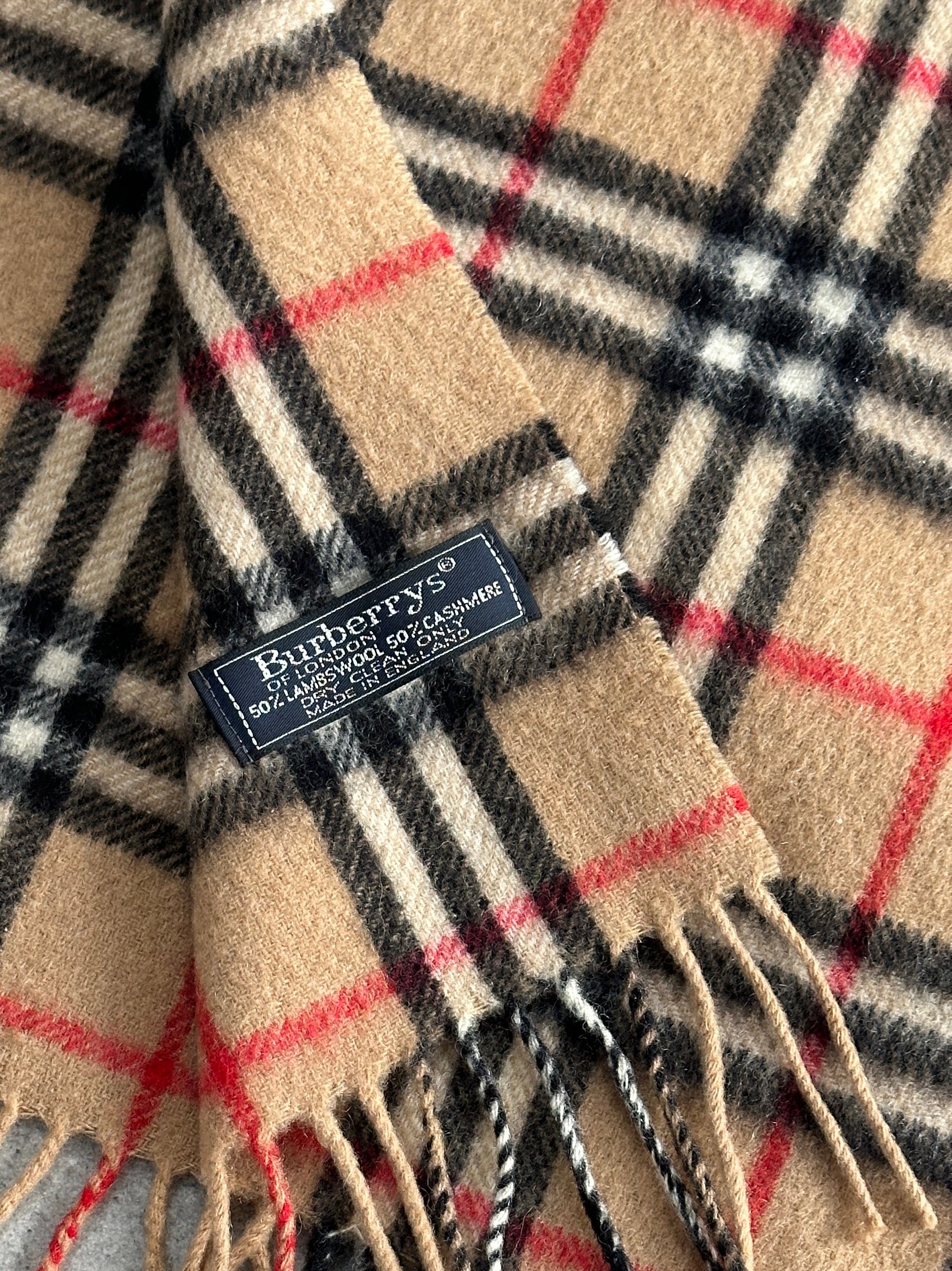 Burberry lambswool and cashmere Nova Check scarf featuring classic plaid pattern and soft texture.
