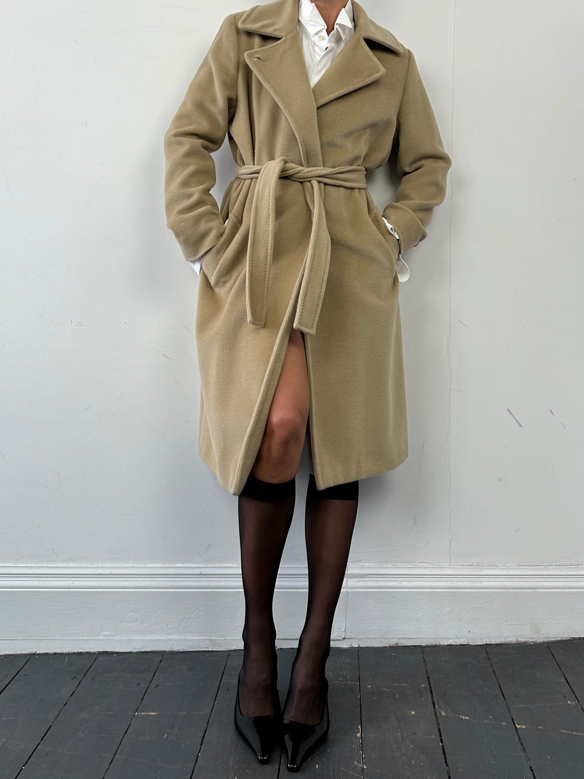 Marella Virgin Wool Cashmere Belted Wrap Coat in beige, featuring a waist belt and classic collar, displayed on a hanger.