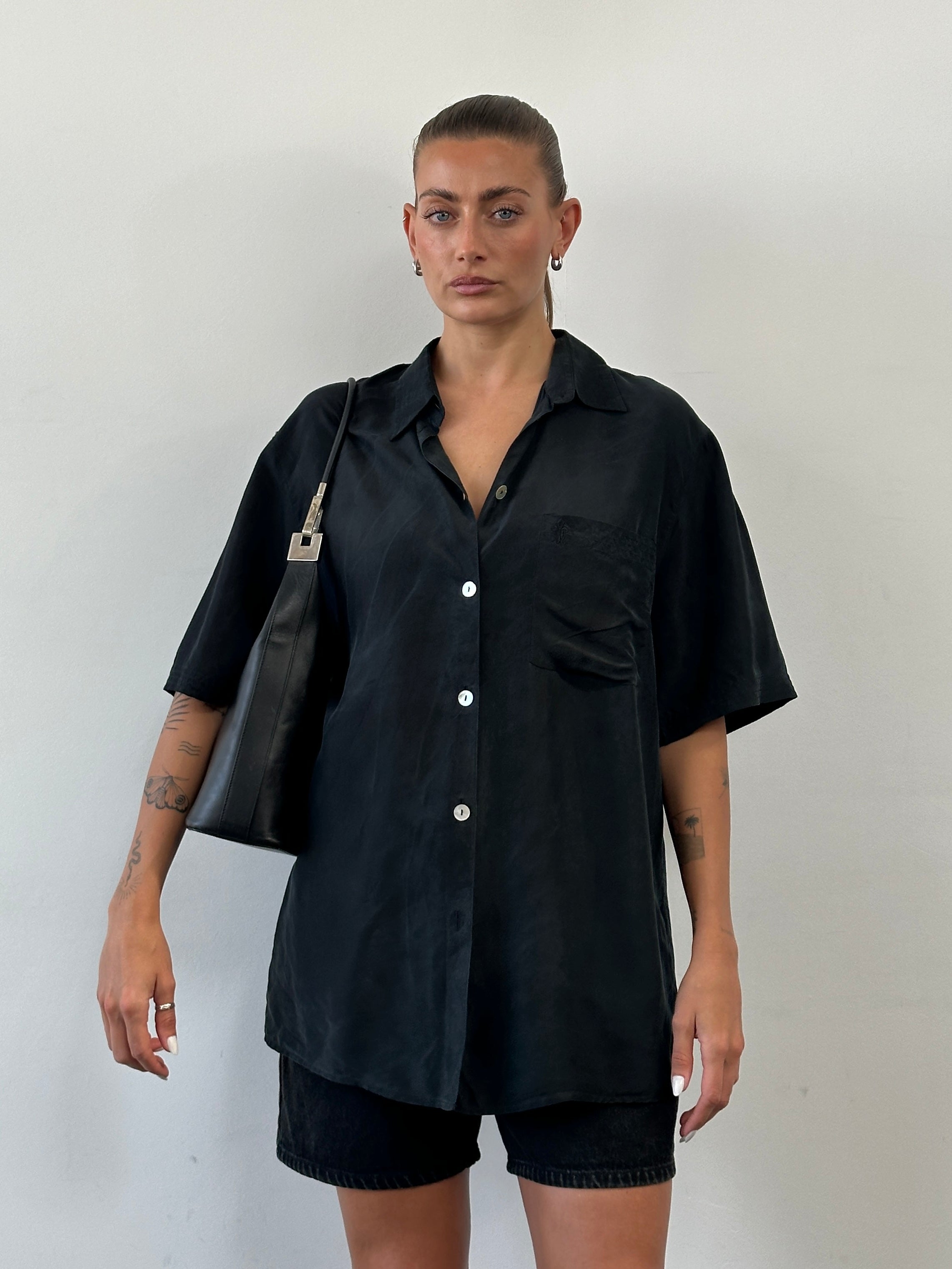 Vintage pure silk short sleeve shirt in XL, featuring a classic design with a smooth texture and elegant fit.