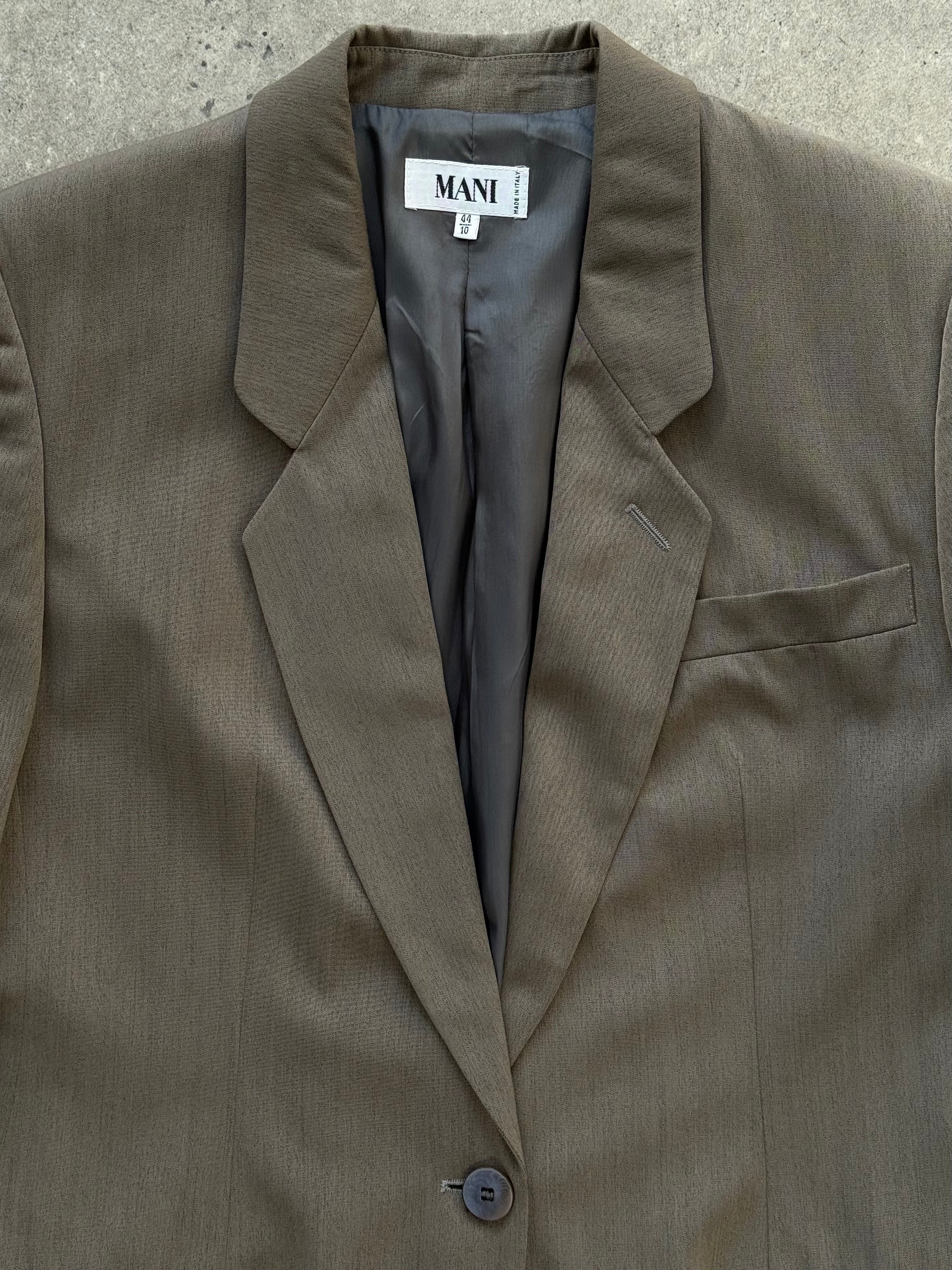 Mani 1990s wool blazer in size S, tailored single-button design with classic lapel and structured fit, in neutral color.