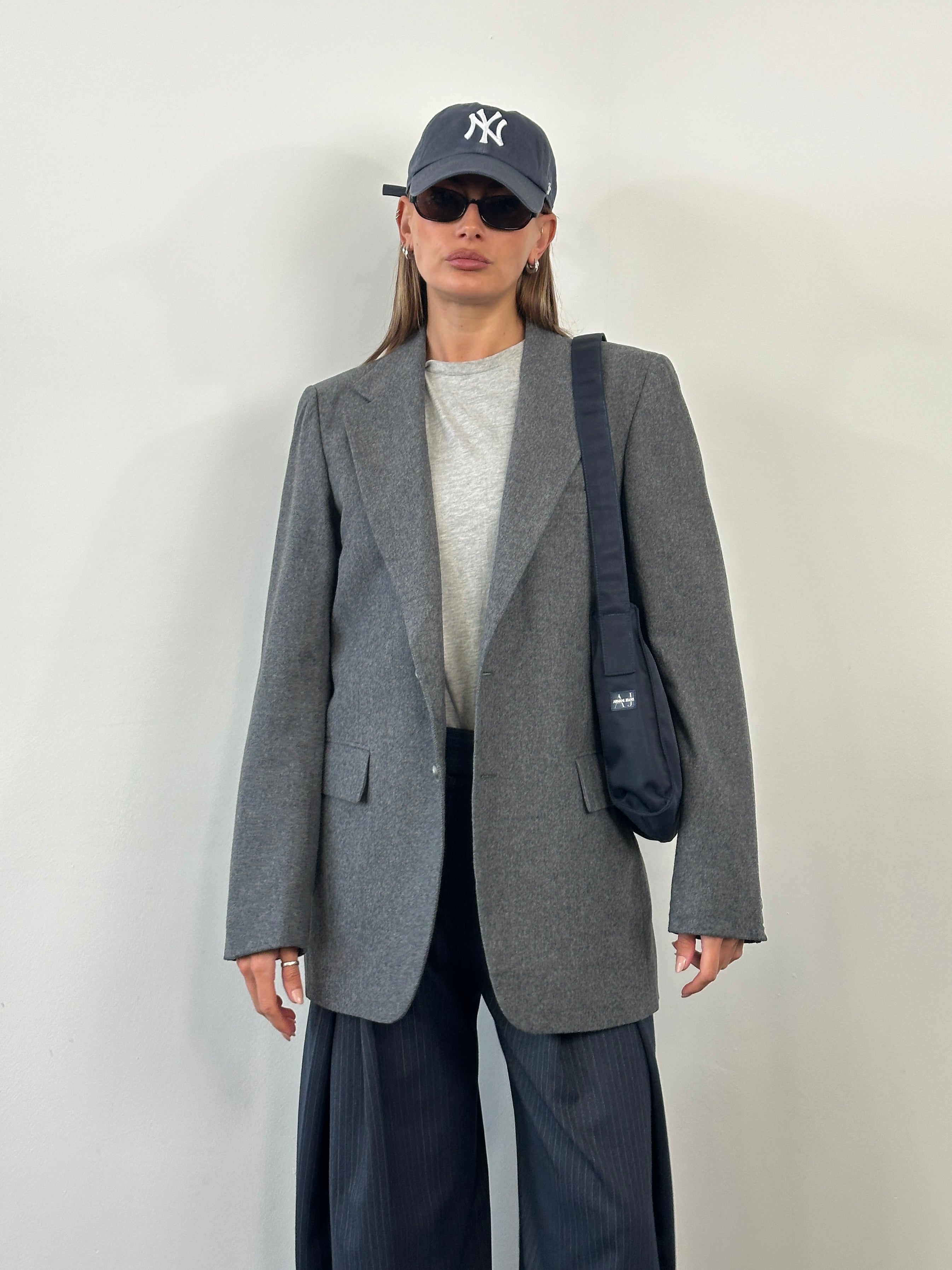Yves Saint Laurent 1990s single-breasted brushed wool blazer in size 38R/L, shown in classic tailored style with lapel collar.