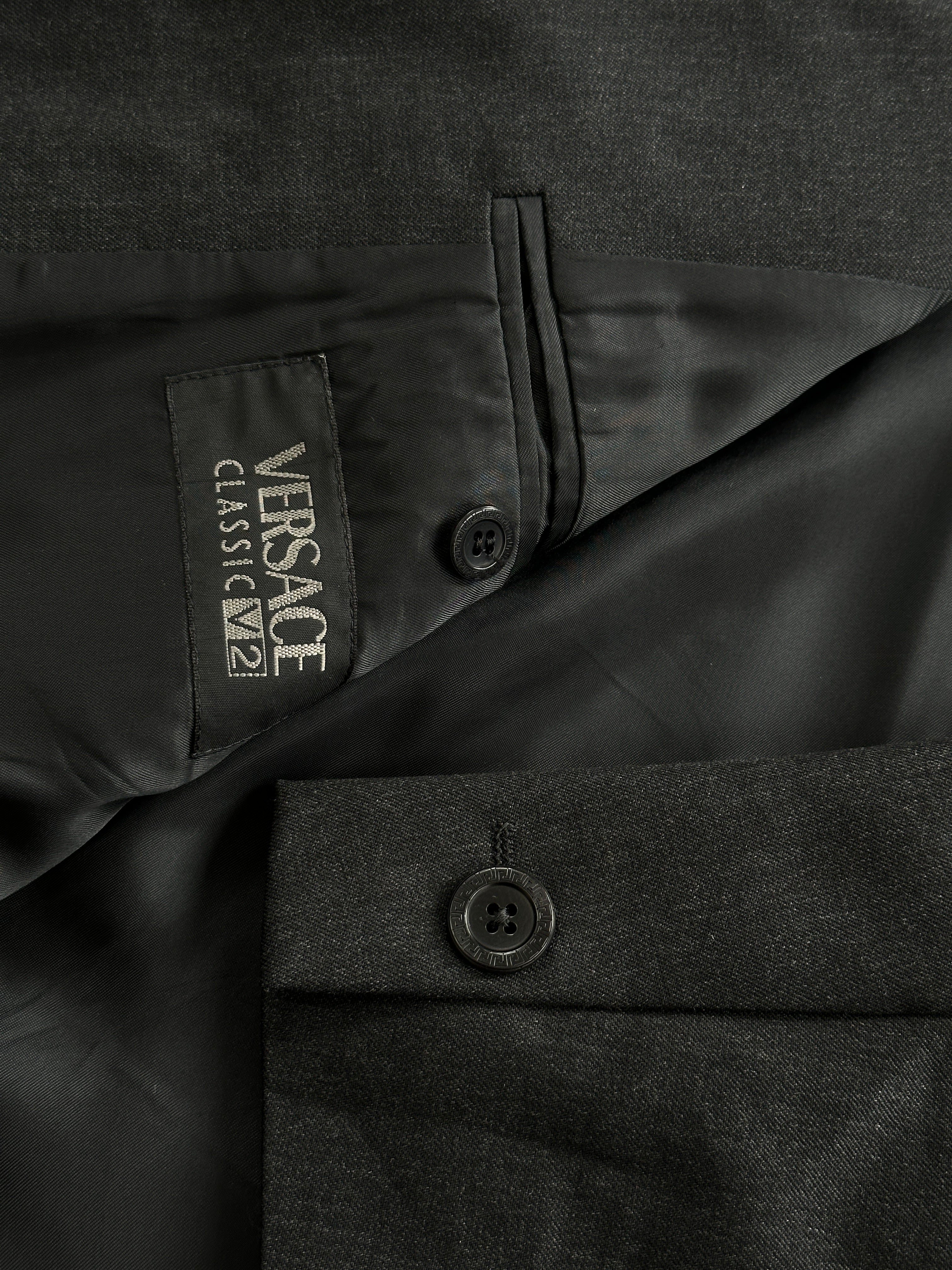 Versace Classic V2 90s pure wool single-breasted blazer in size 44R/XL, black color, tailored fit with notch lapels.
