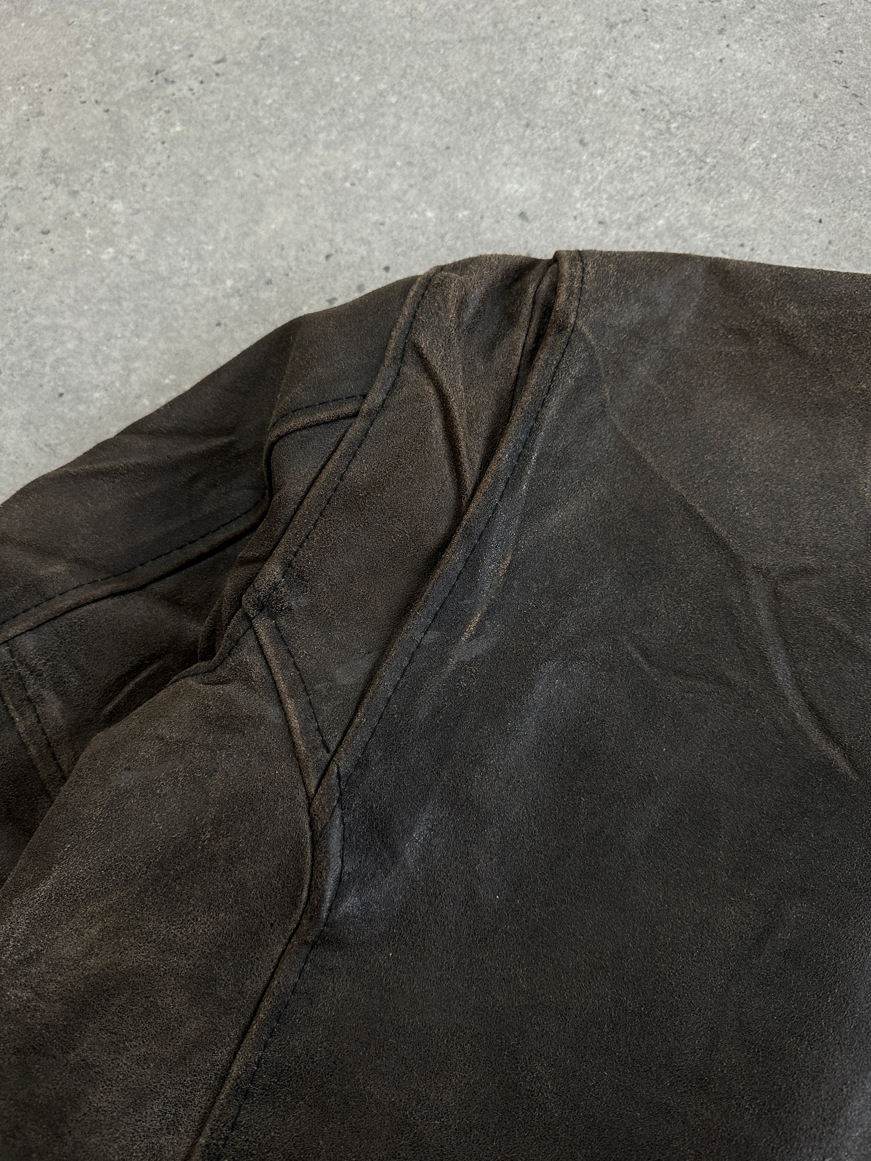 Vintage Italian 1980s distressed leather jacket, XL size, featuring worn leather and classic design elements.