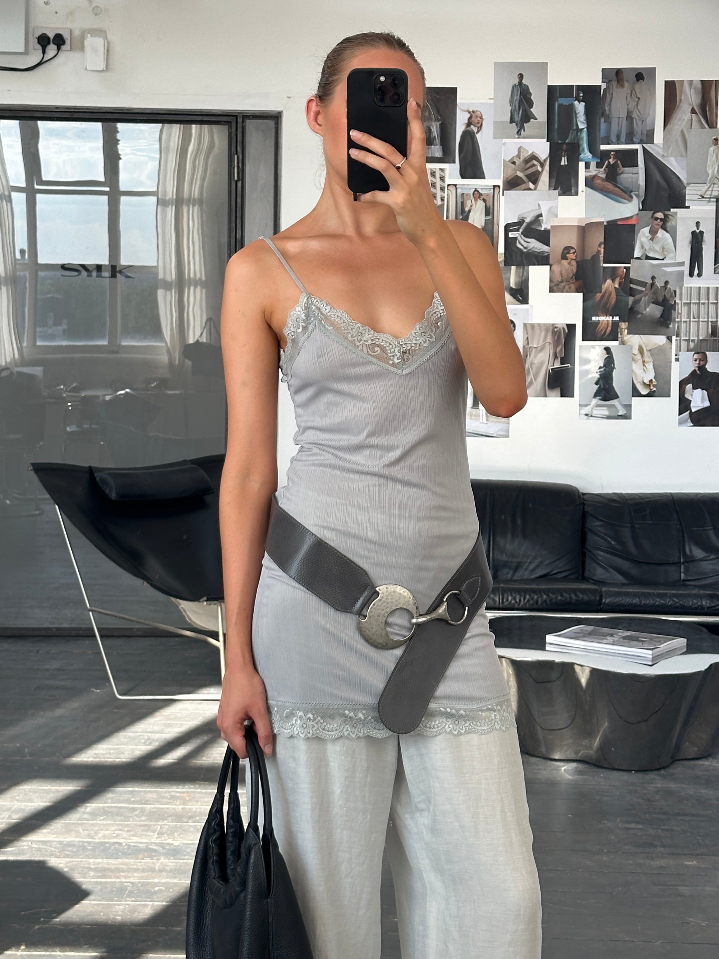 Italian Vintage 1990s lace sheer mini slip dress, size small, featuring delicate lace details and a vintage-inspired silhouette.