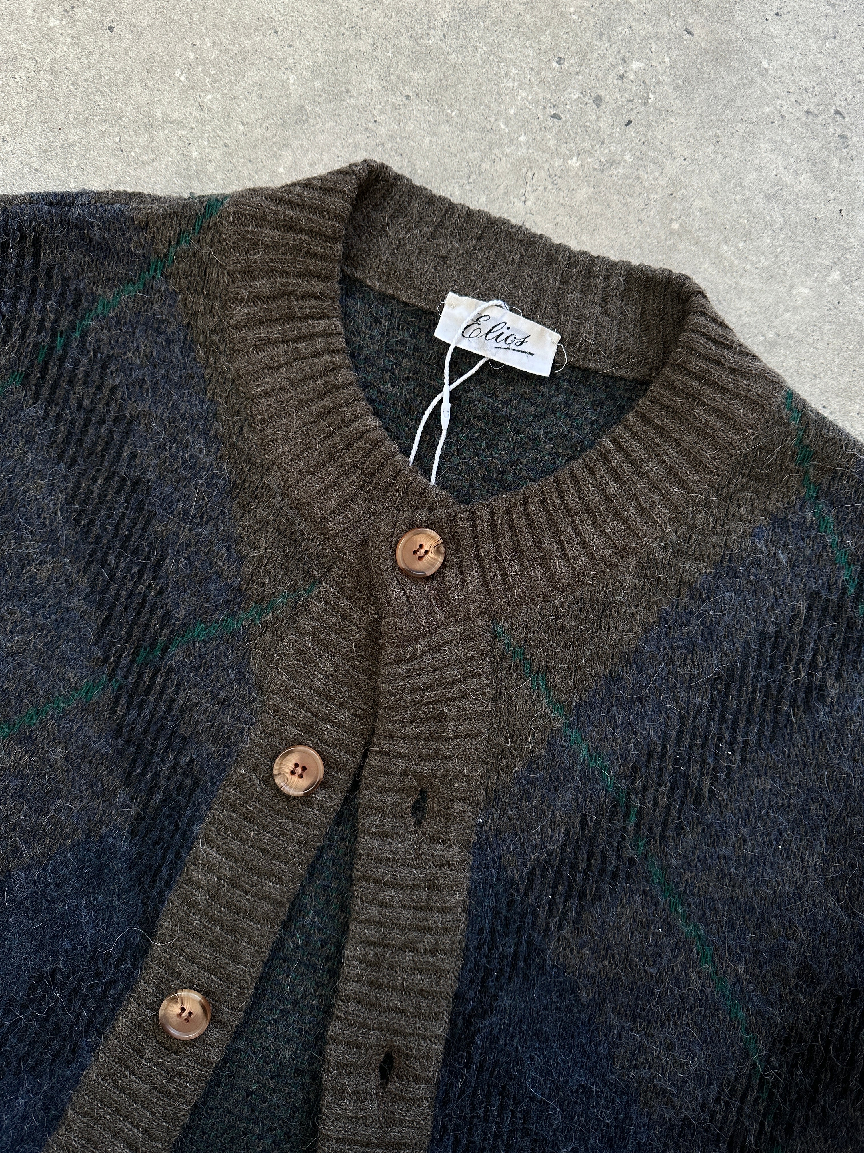 Italian vintage alpaca wool print cardigan in size L/XL, featuring a cozy, patterned design with button closure and soft texture.