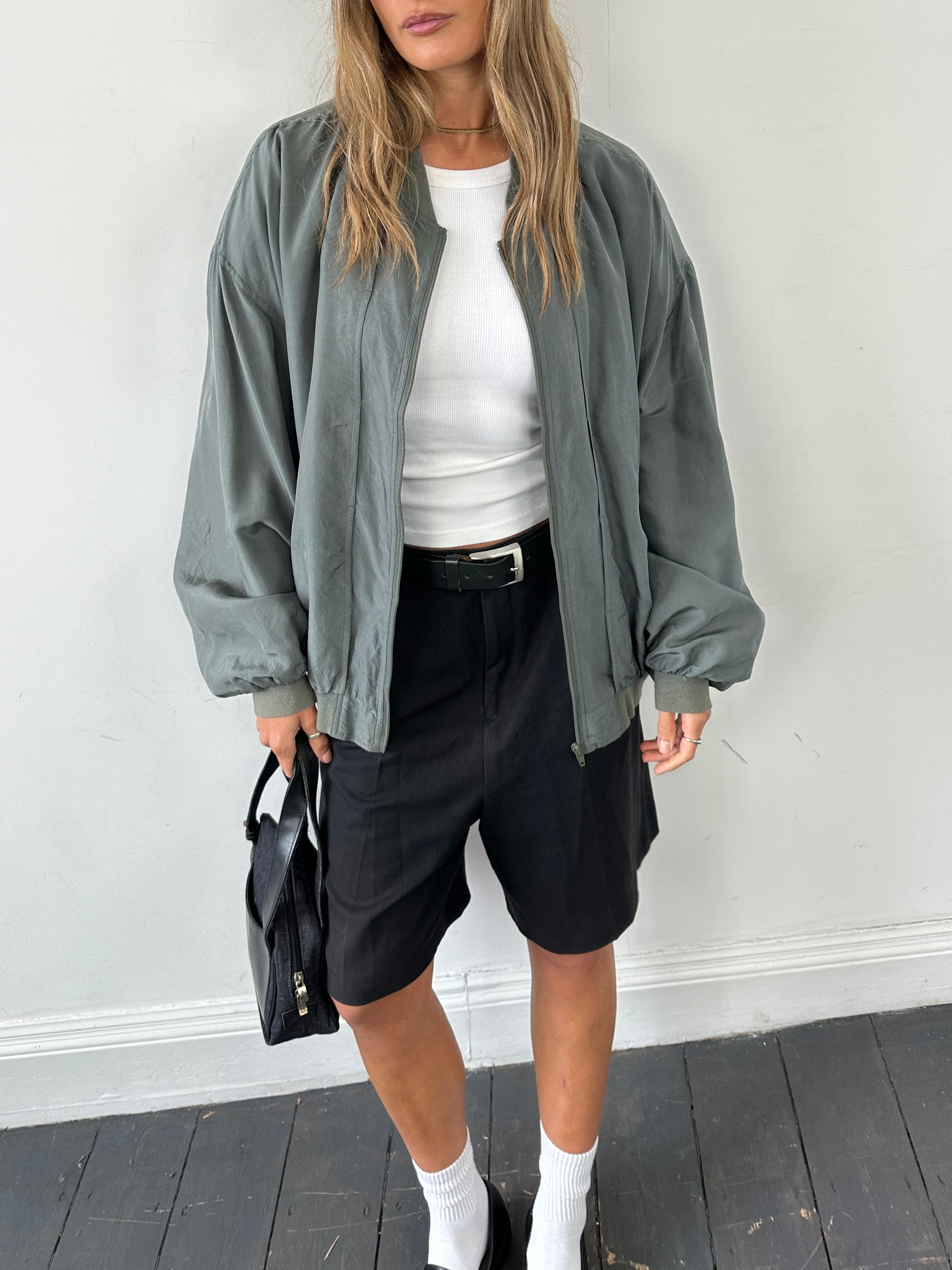 Vintage 80s pure silk bomber jacket in XXL with classic design, featuring a smooth silk fabric and retro style.