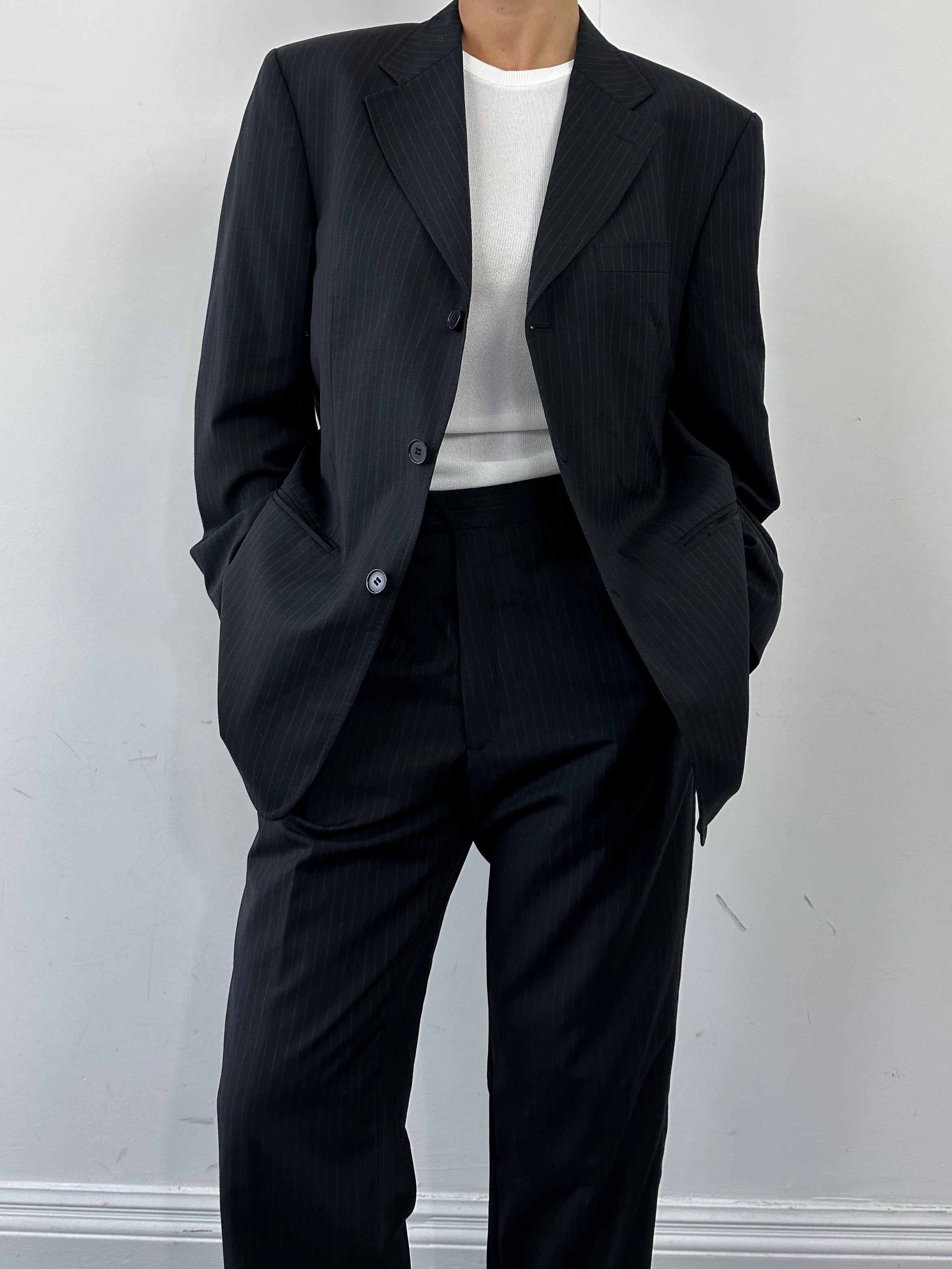 Gianfranco Ferre pinstripe pure wool single-breasted suit in size 42R/W36, displayed as a stylish jumpsuit with classic lapels.