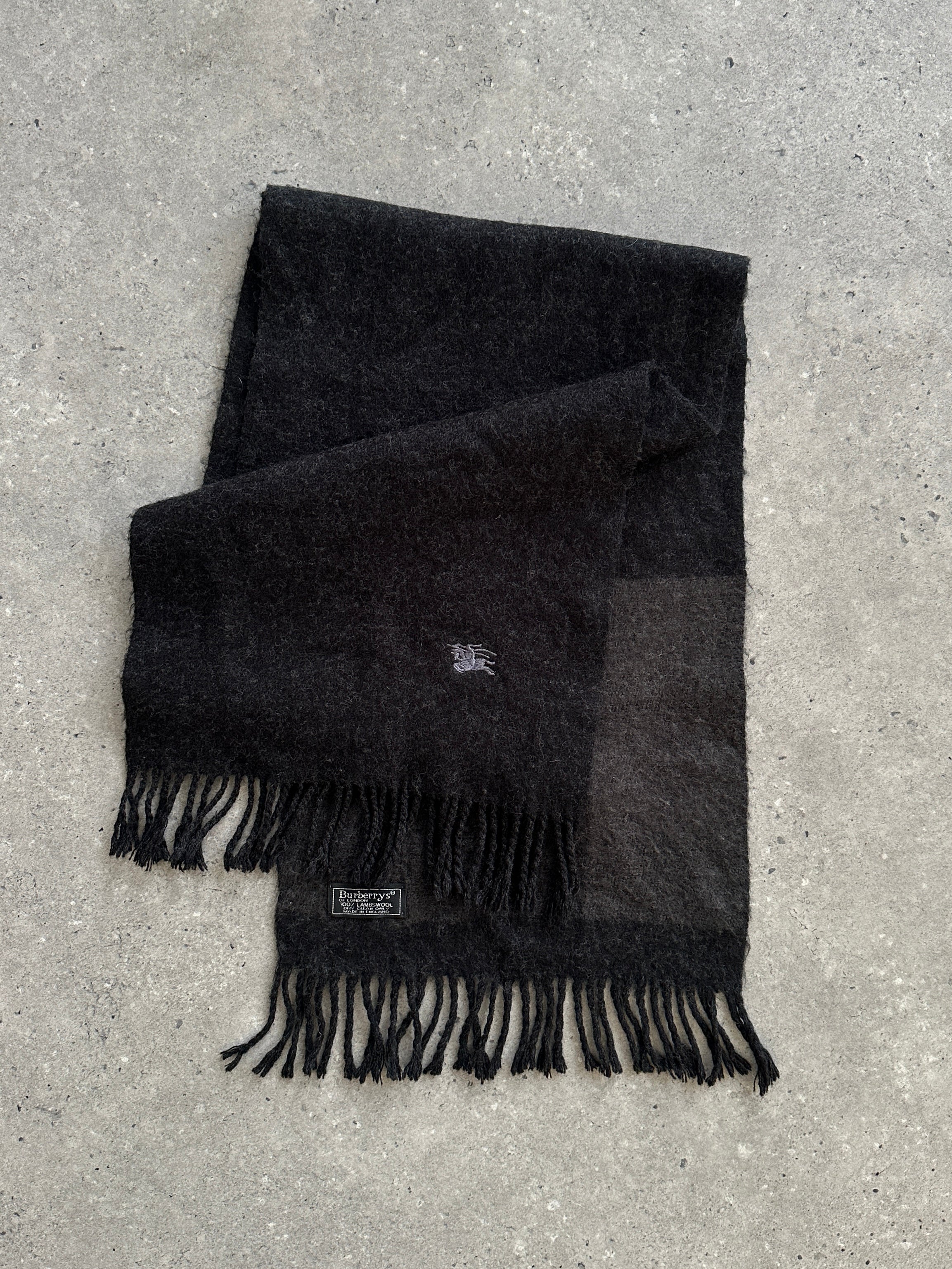 Burberry Pure Lambswool Logo Scarf featuring the iconic check pattern and subtle branded logo, soft and warm for cold weather.