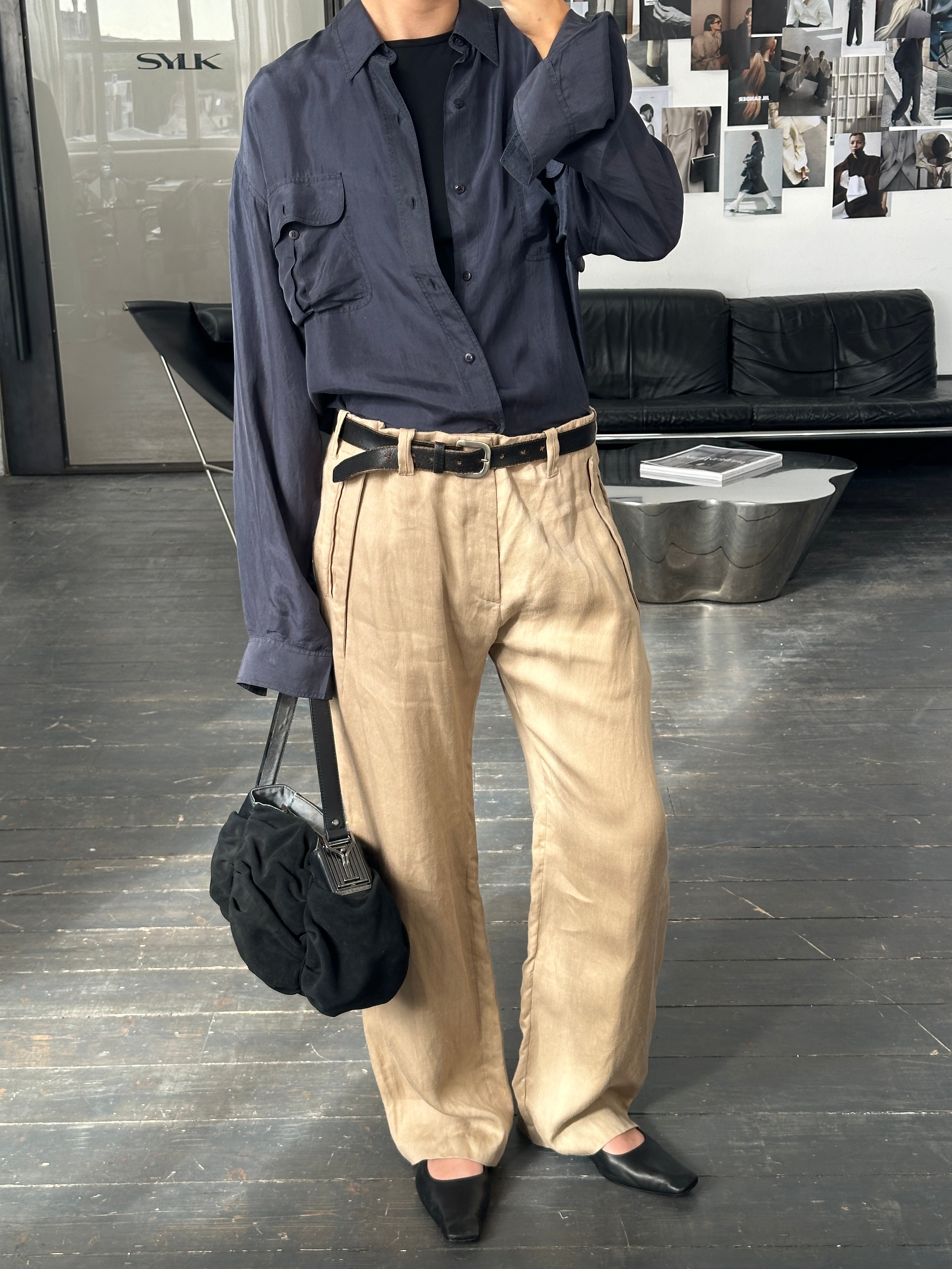 Vintage 1990s relaxed pure silk shirt in XL size, featuring a smooth fabric and classic collar, displayed on a hanger.