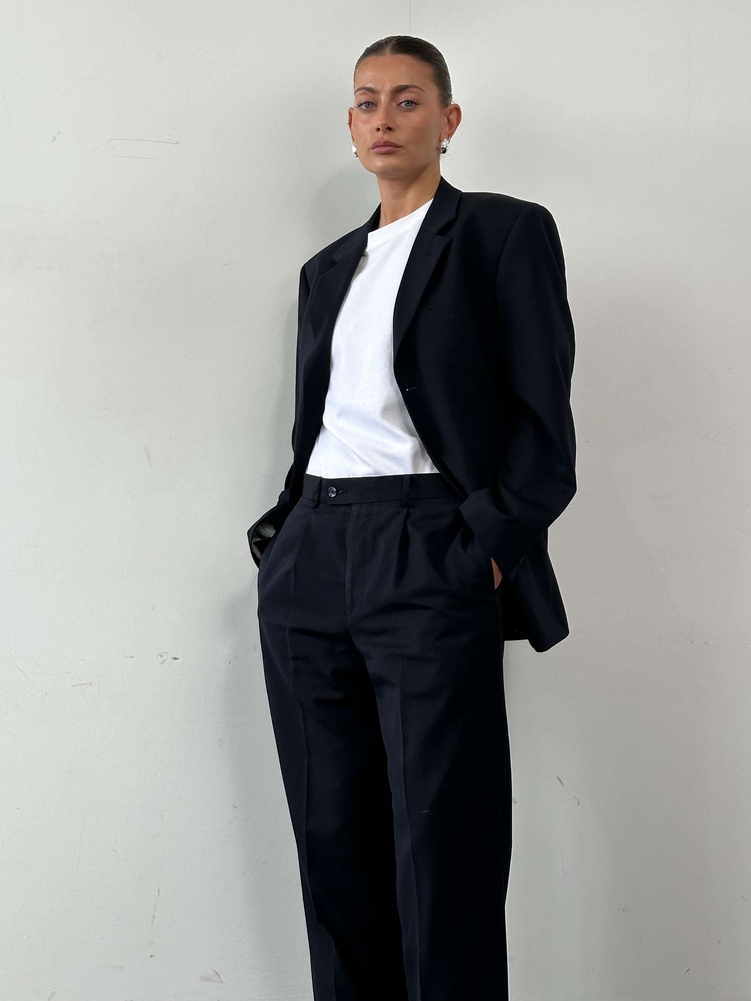Vintage wool high-waisted straight-leg trousers, W32, in classic style, shown in a natural pose with a focus on fit and fabric.