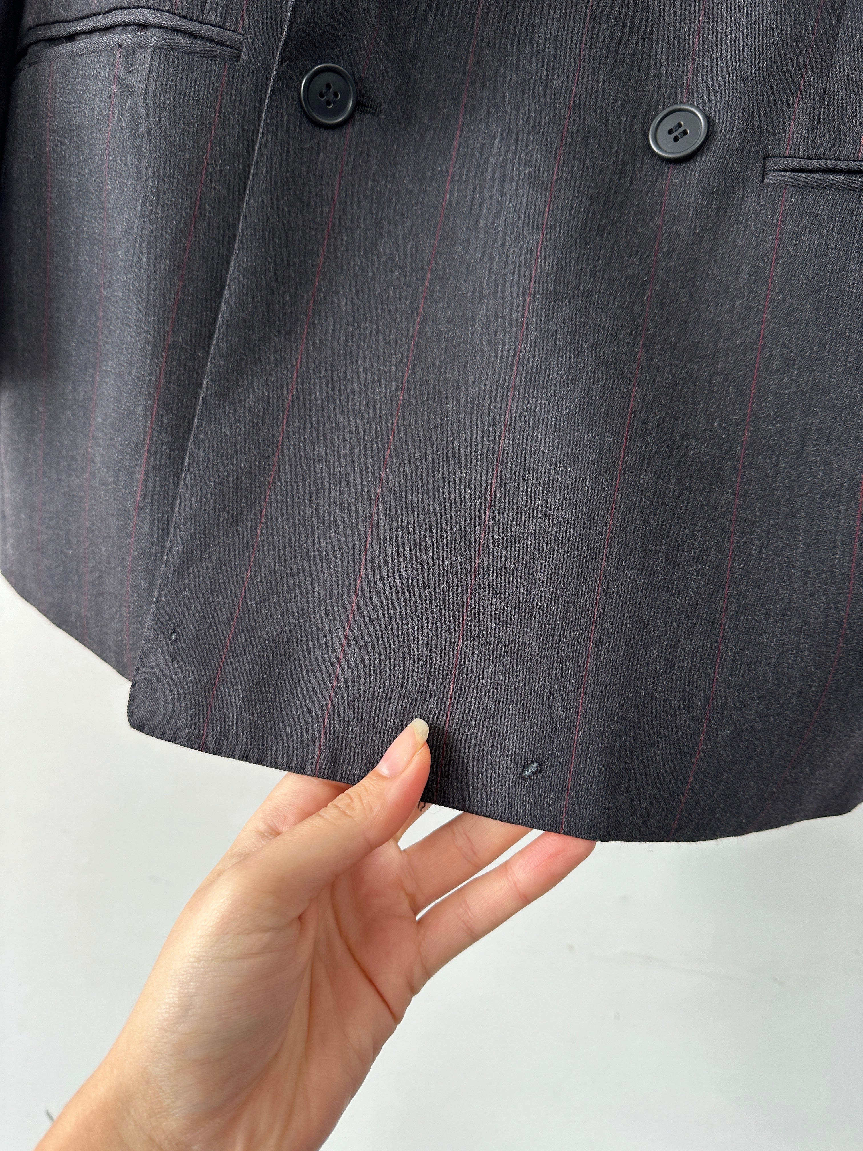 Valentino virgin wool double-breasted blazer in size 36R/S, tailored fit, dark navy color, with classic lapel and button details.