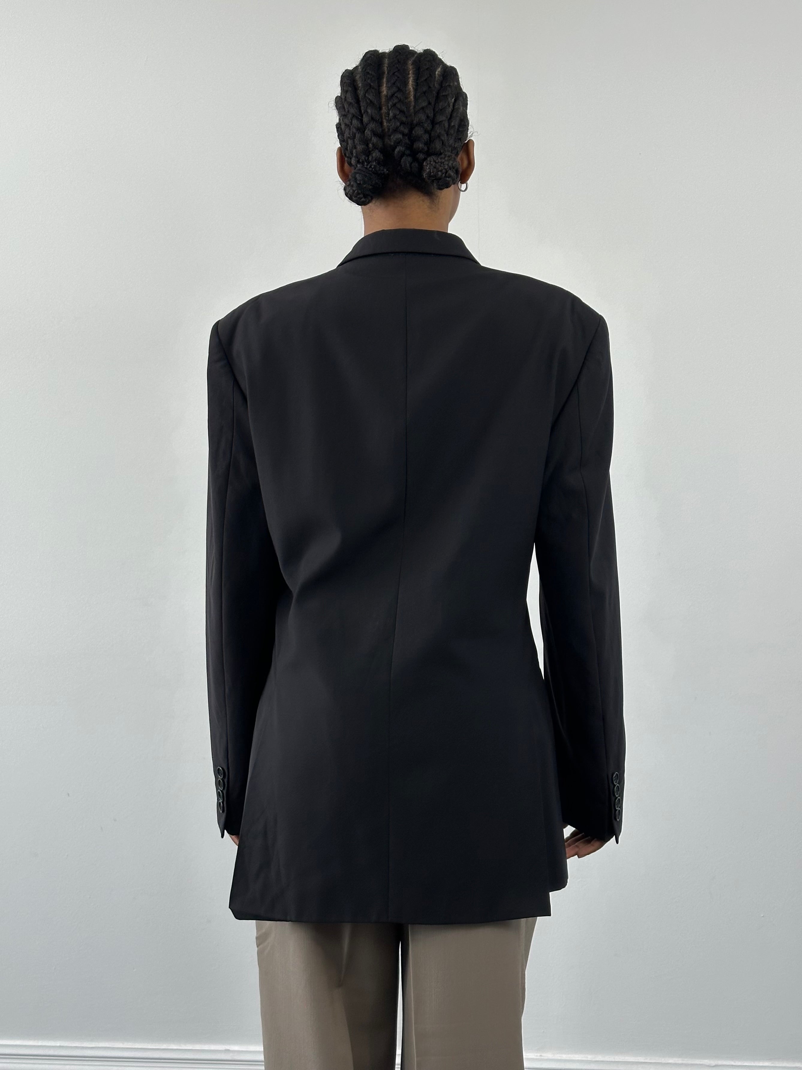 Yves Saint Laurent Pour Homme 1990s pure wool blazer in size 40R/L, tailored fit with classic lapel and button closure.