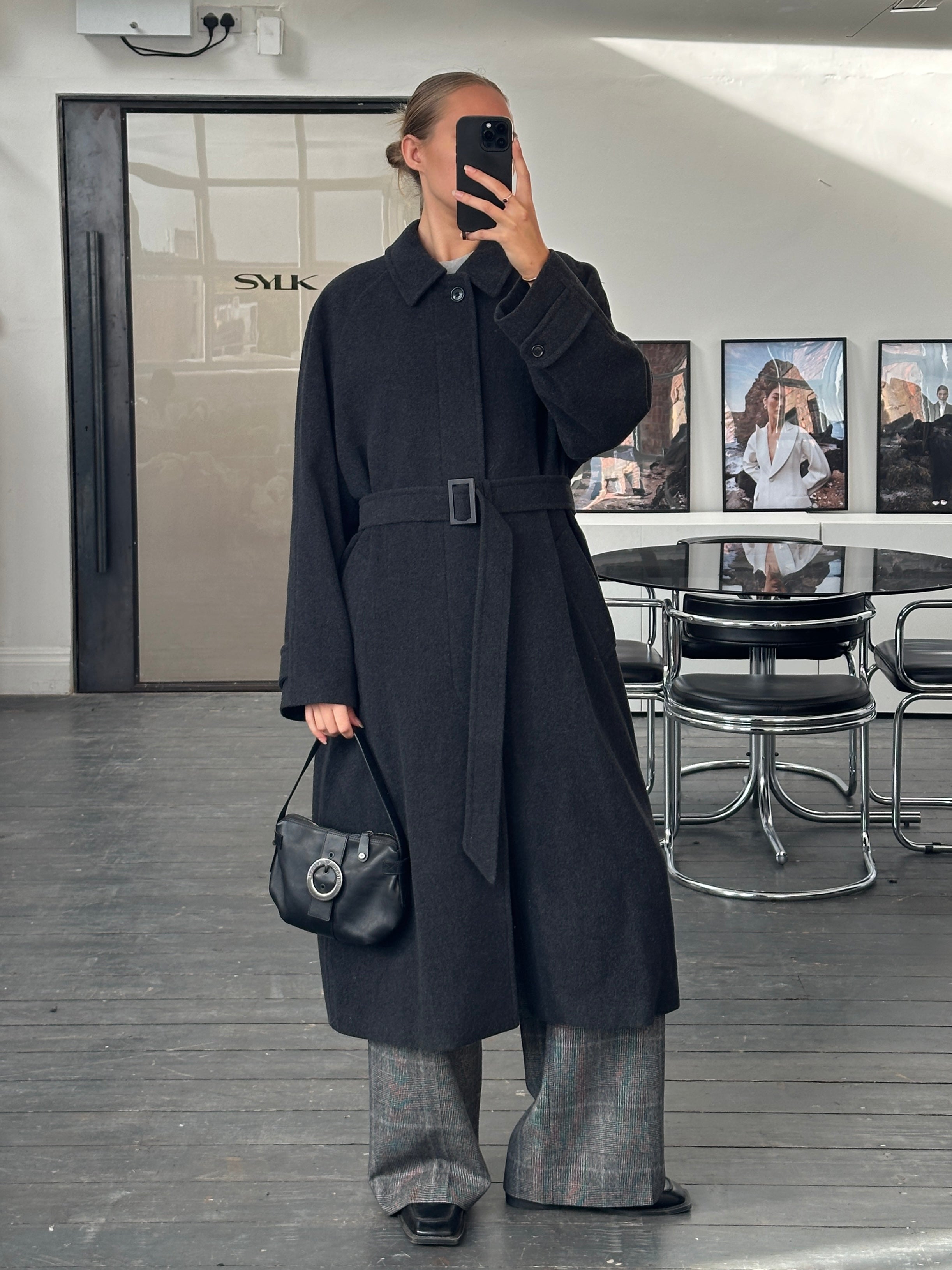 Vintage 1990s wool and cashmere belted coat in size L/XL, featuring a classic design and cozy texture.