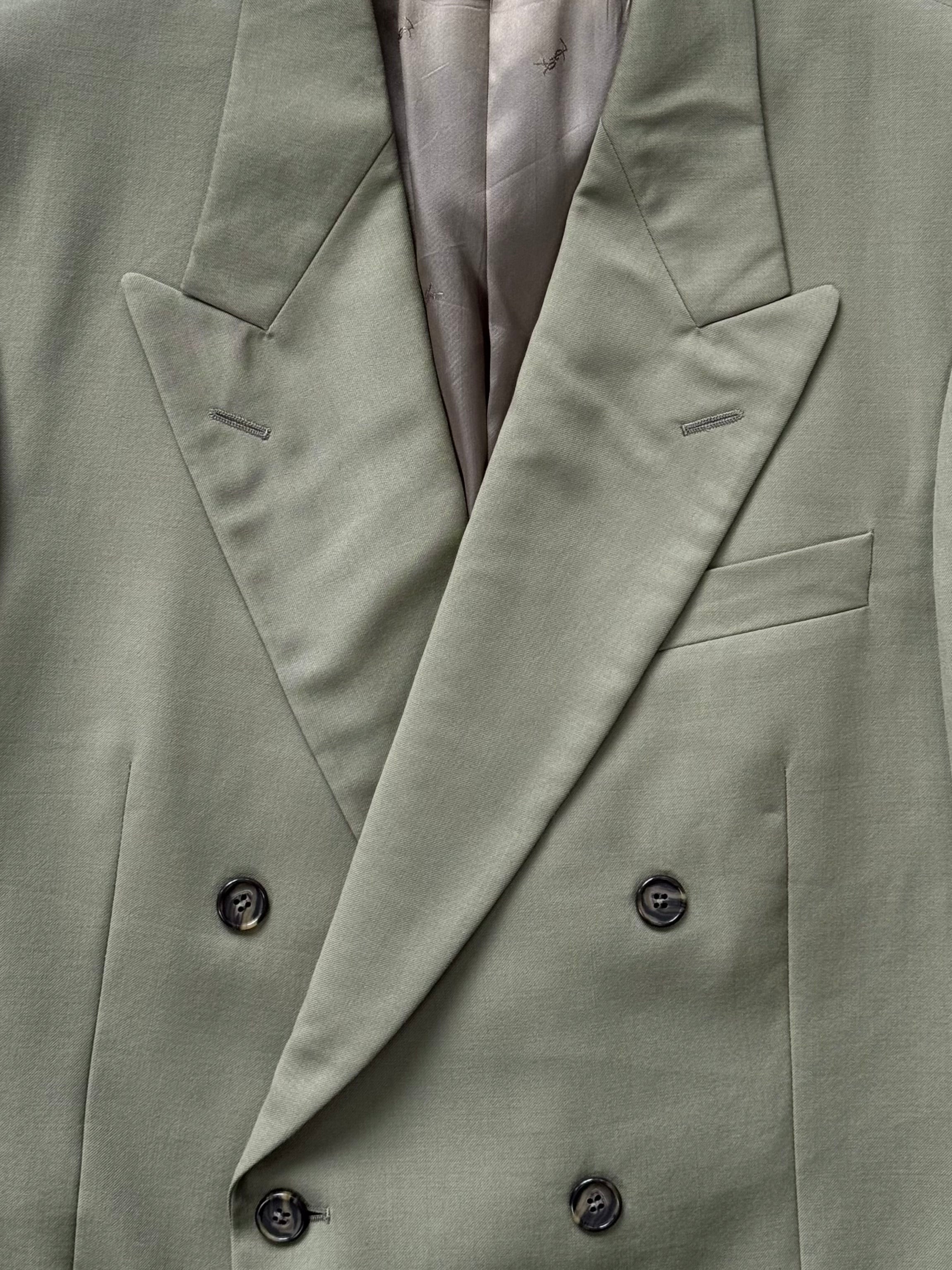 Yves Saint Laurent 1980s pure wool double-breasted blazer in size 40R/L, tailored fit with classic lapels and structured design.