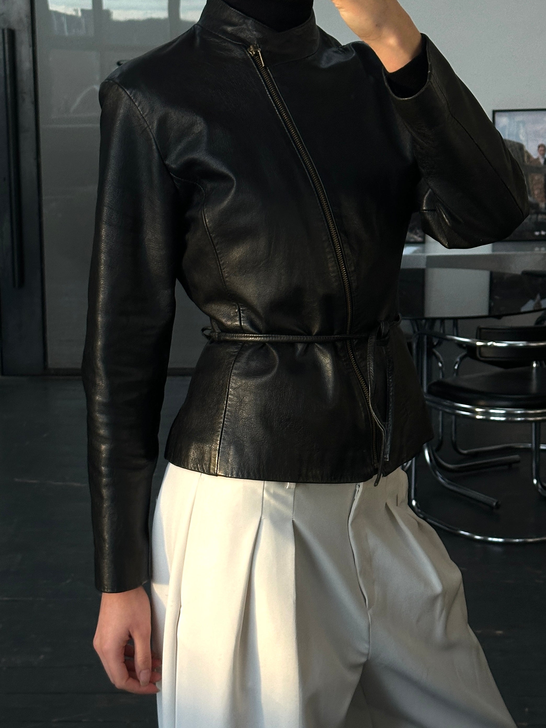 Vintage 2000s asymmetric tie belt leather jacket, size small, featuring a stylish vintage leather design and unique asymmetric cut.