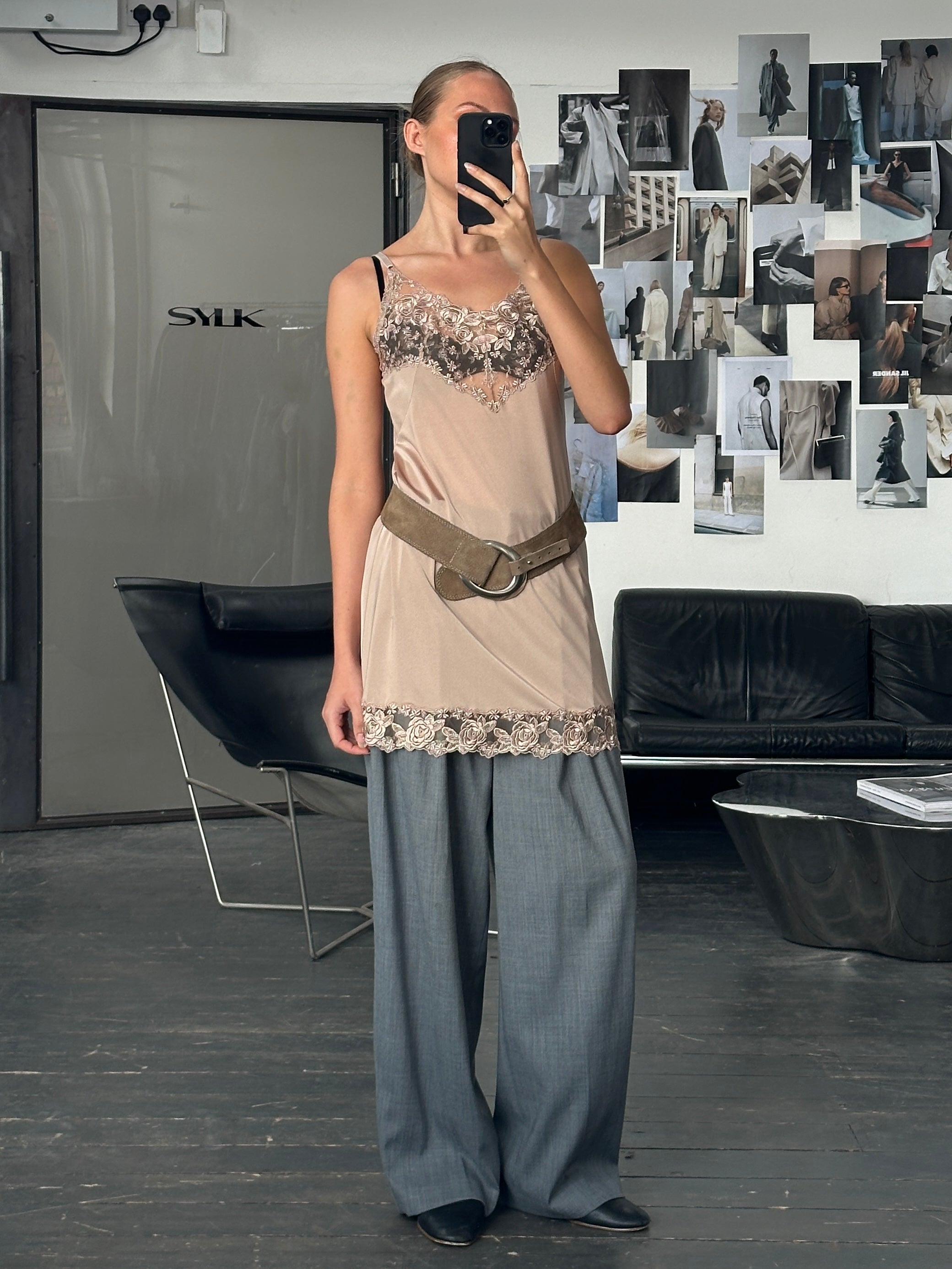 Vintage 1990s lace mini slip dress in size M, featuring delicate lace fabric and a classic vintage design.