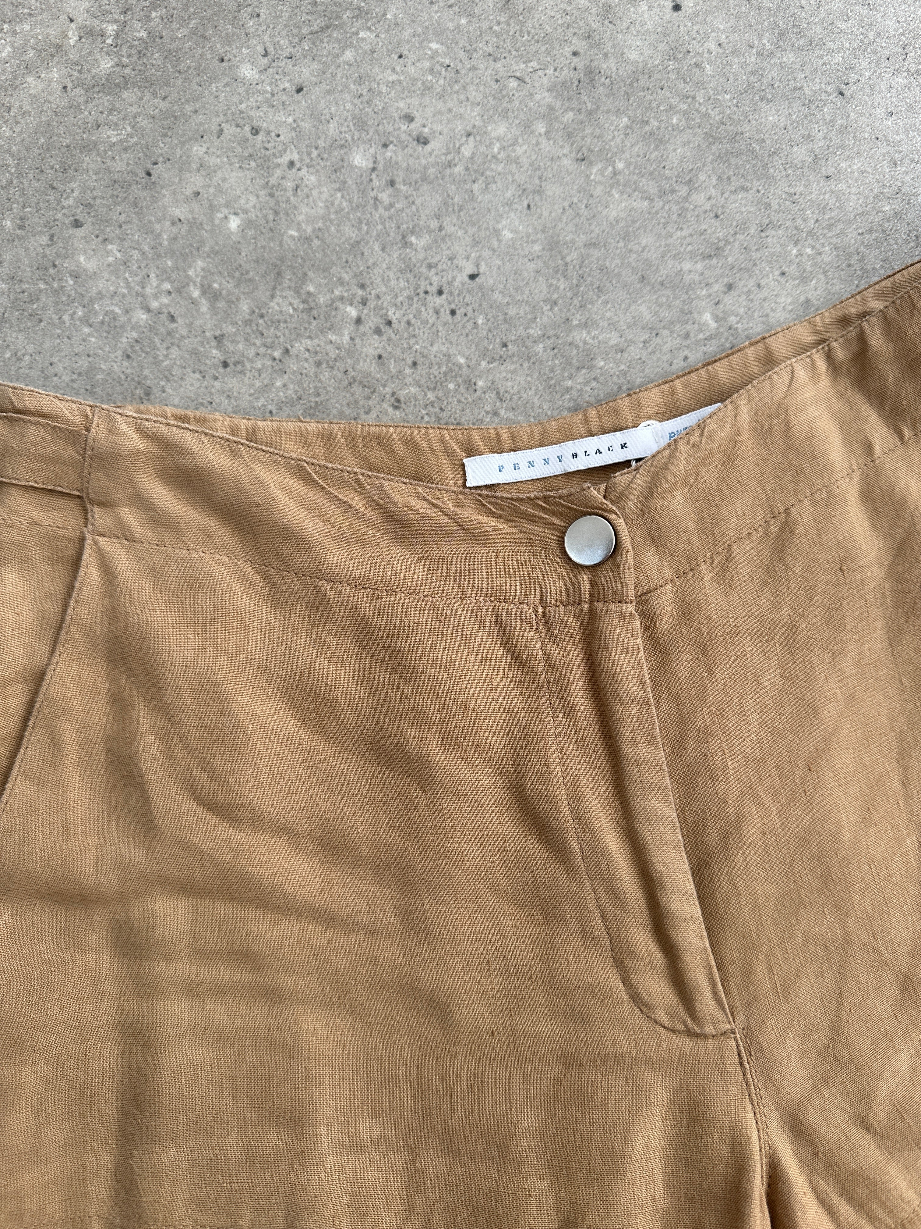 Vintage pure linen low waist wide leg trousers in natural beige, showcasing relaxed fit and lightweight fabric.