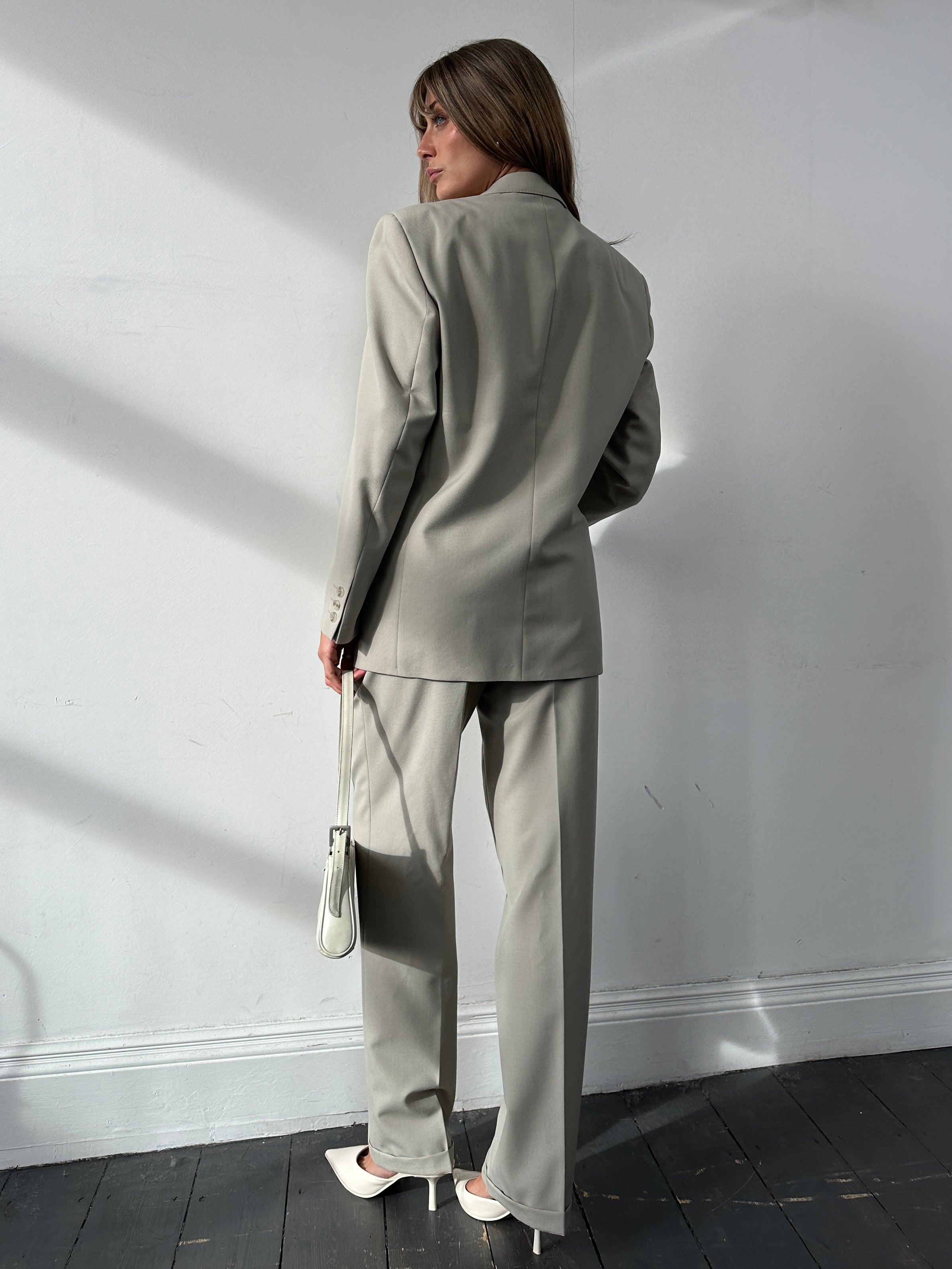 Vintage wool double-breasted jumpsuit in size 40R/W30, featuring classic tailoring and a vintage style.