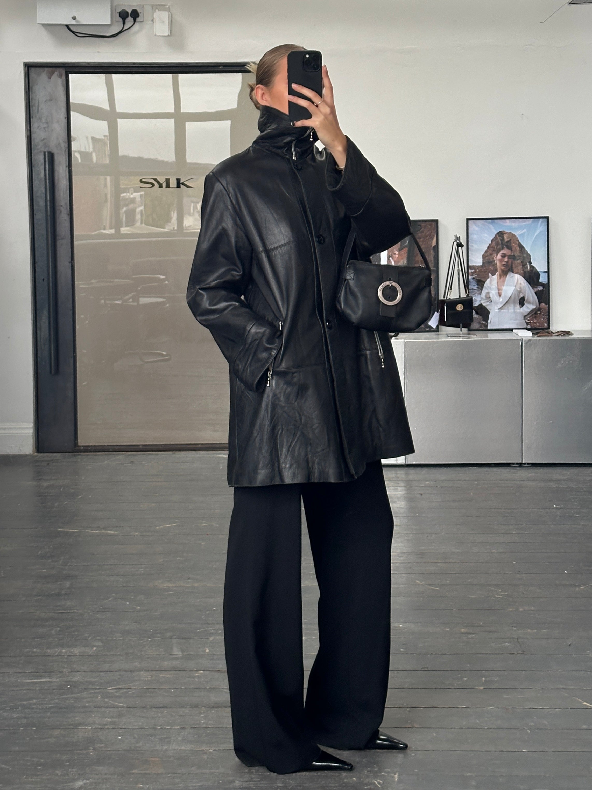 Conbipel 1990s smooth leather high neck coat in size L/XL, stylish jacket with a sleek design and high collar.