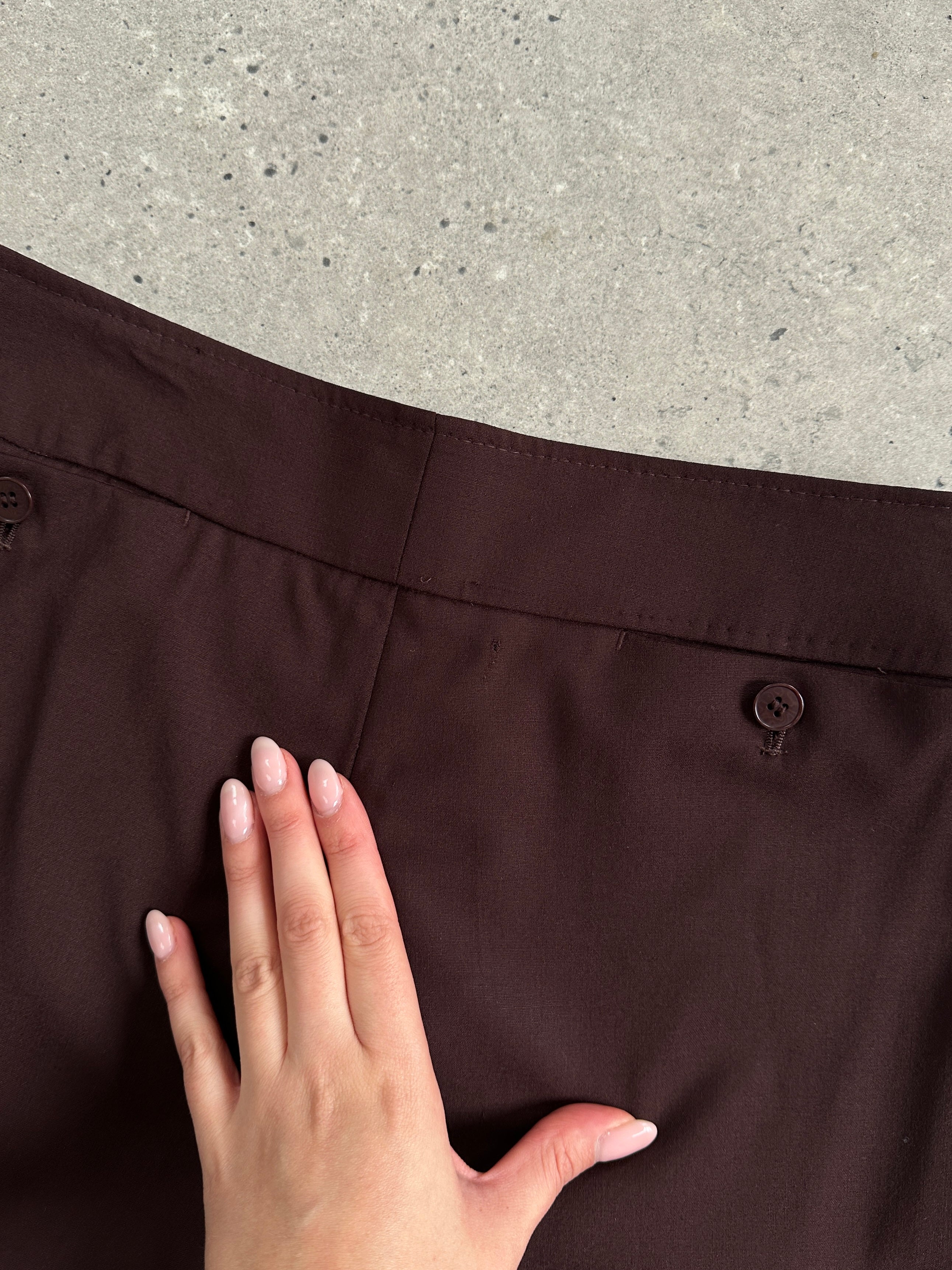 Max Studio wool wide-leg jumpsuit with single-breasted design, featuring a tailored fit and sophisticated style in a neutral color.