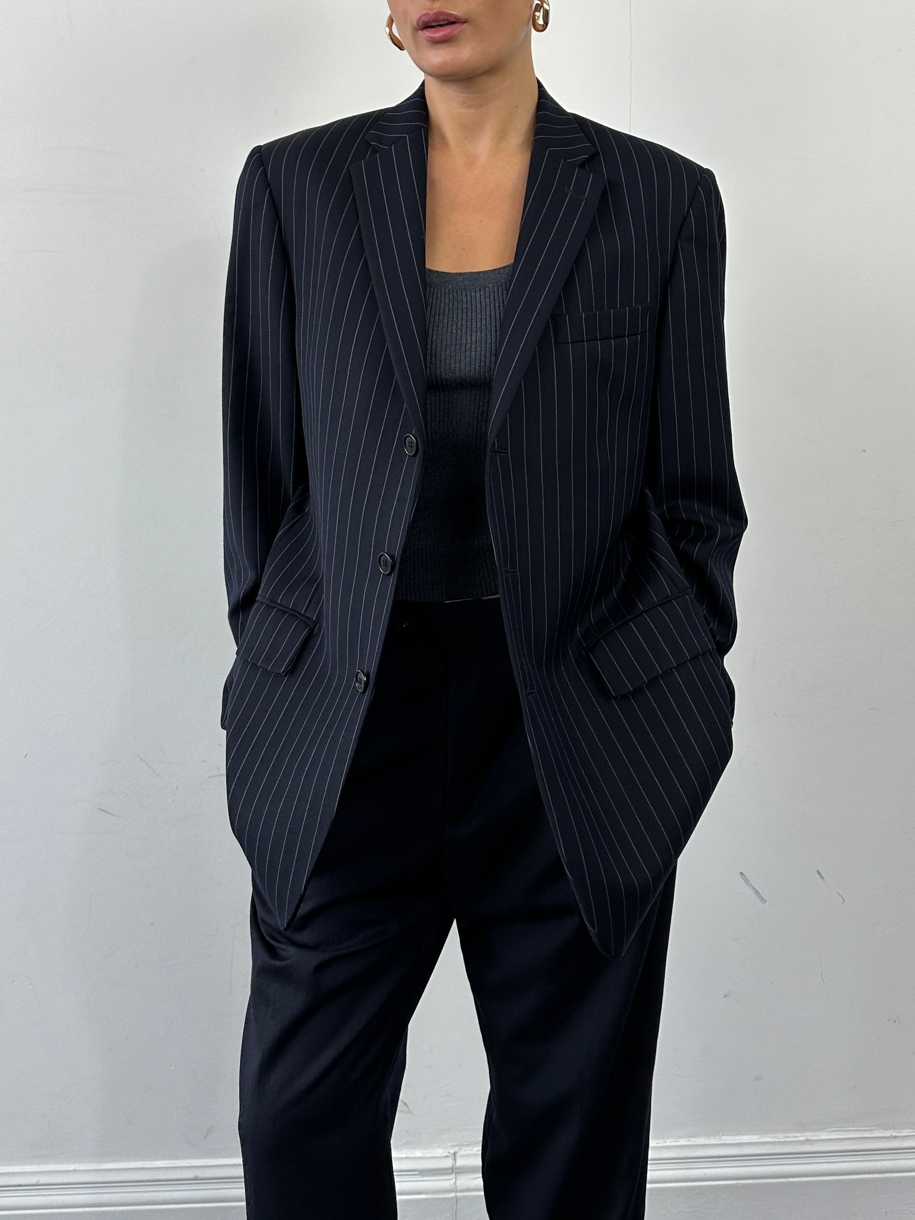 Vintage pinstripe wool blazer, single-breasted, size 42R/XL, classic tailored design with notch lapel and button closure.