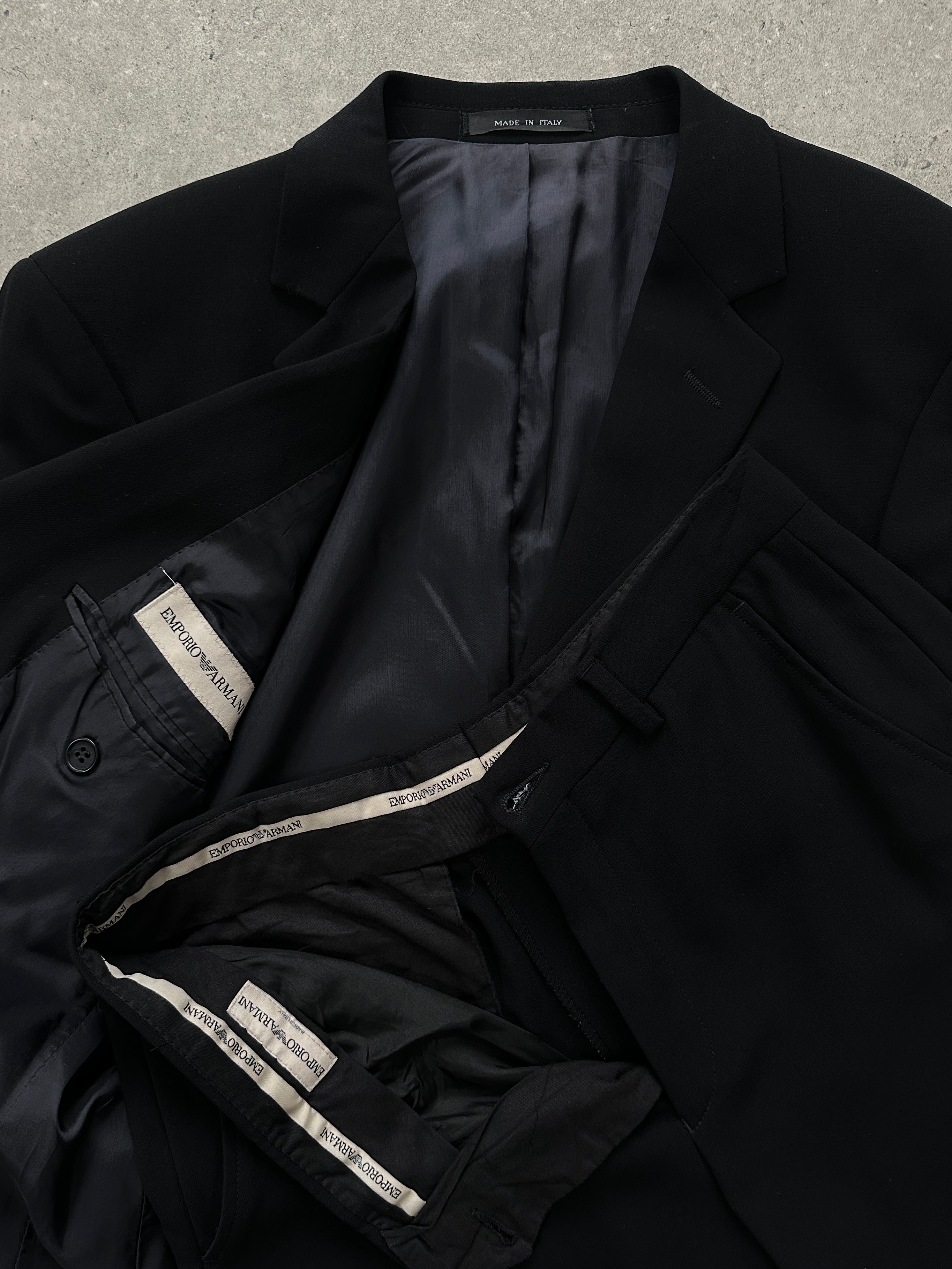 Emporio Armani 1990s pure wool single-breasted suit in size 36R/W28, shown on a hanger with a classic tailored fit