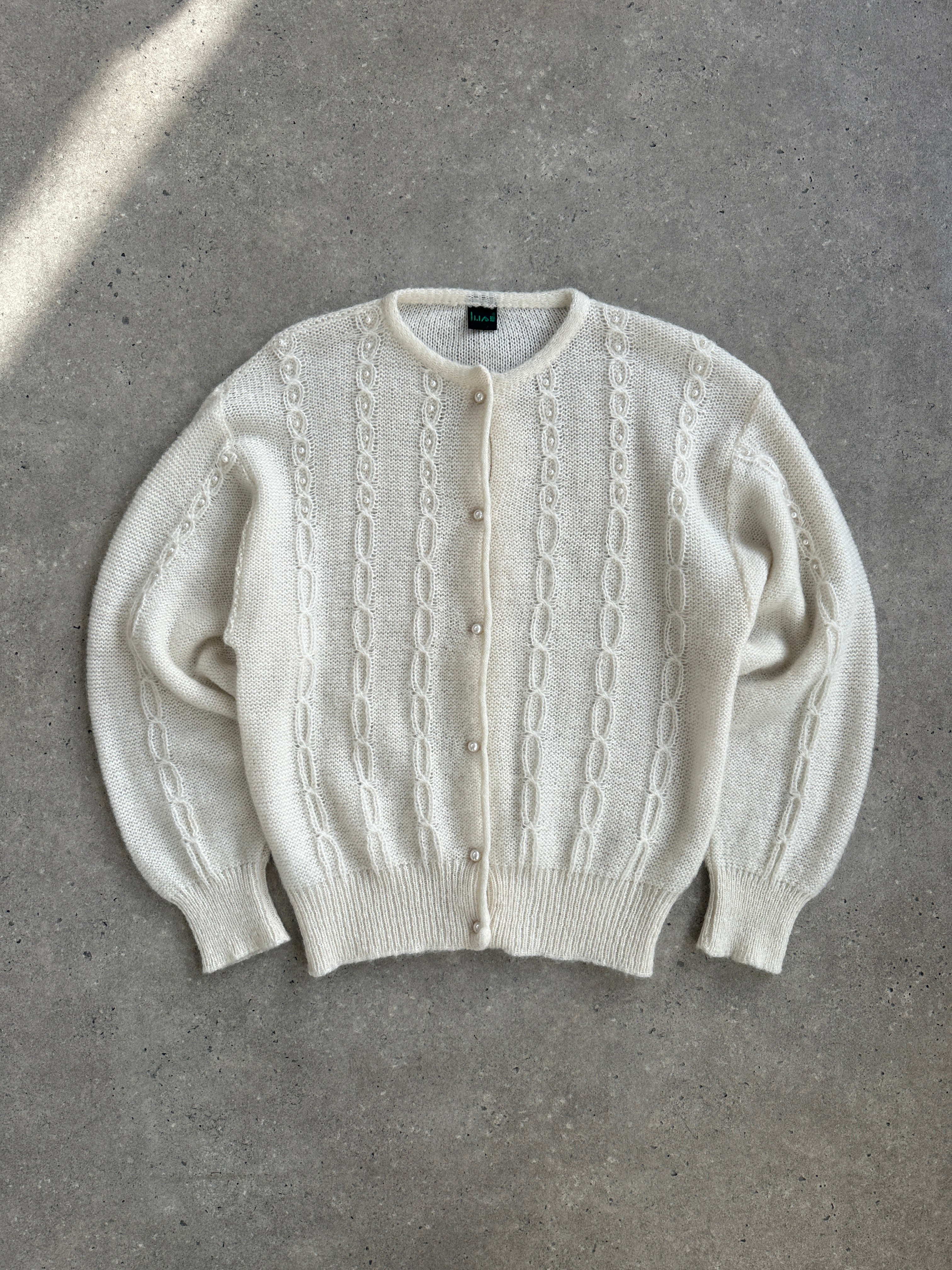 Vintage Italian 1980s mohair knitted cardigan, size M, with retro style and textured knit design.