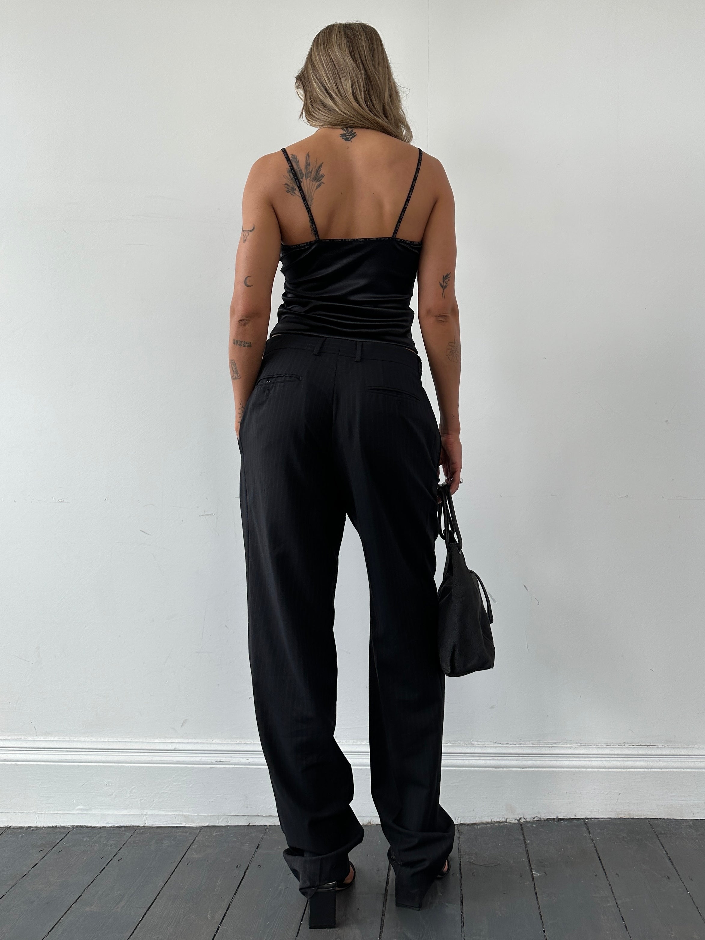 Vintage brand pinstripe virgin wool pleated tailored tall trousers in waist size W32, showing the classic design and tailored fit.