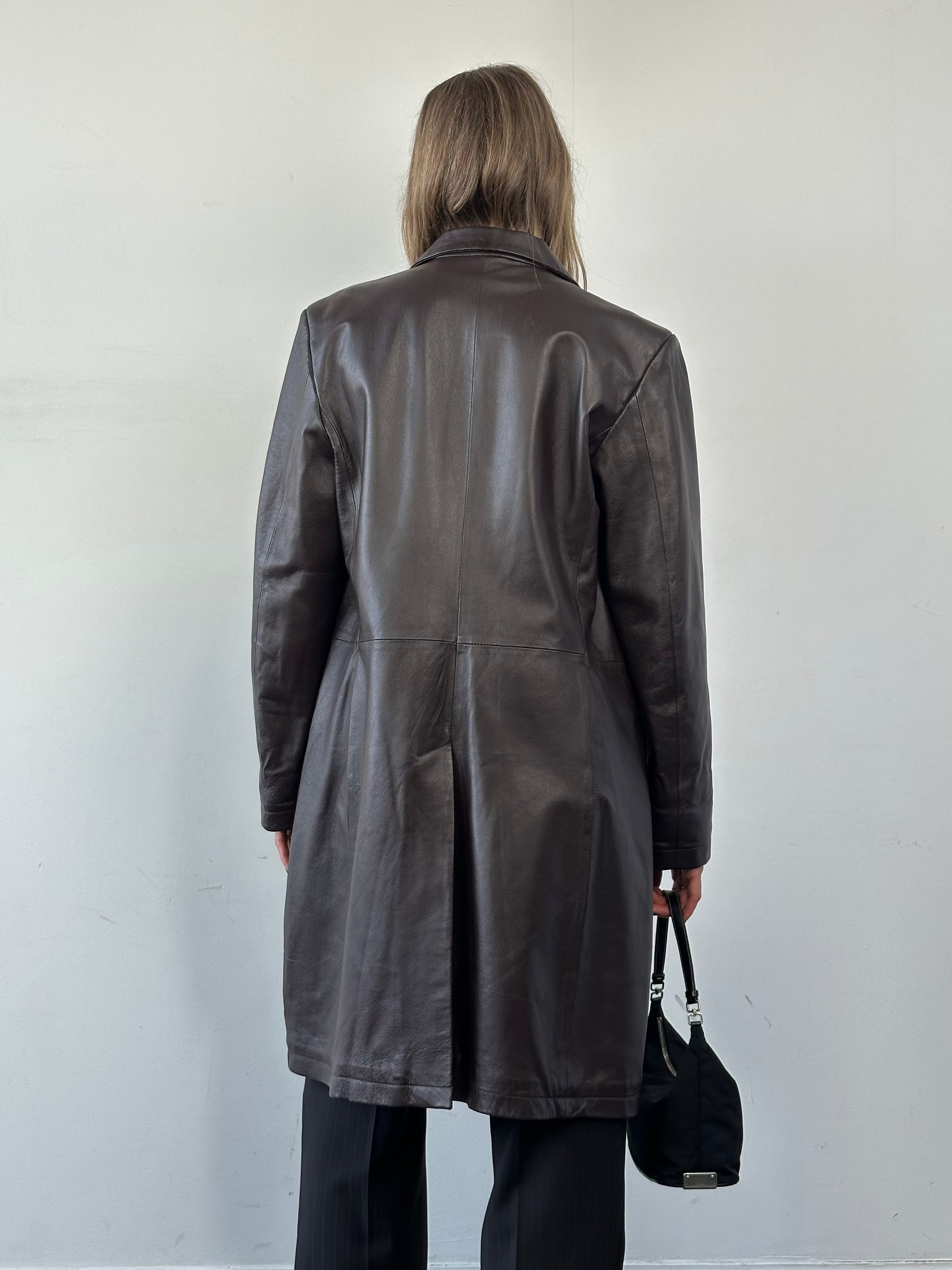 Vintage minimal leather trench coat jacket in size large, showcasing sleek design and classic brown leather material.