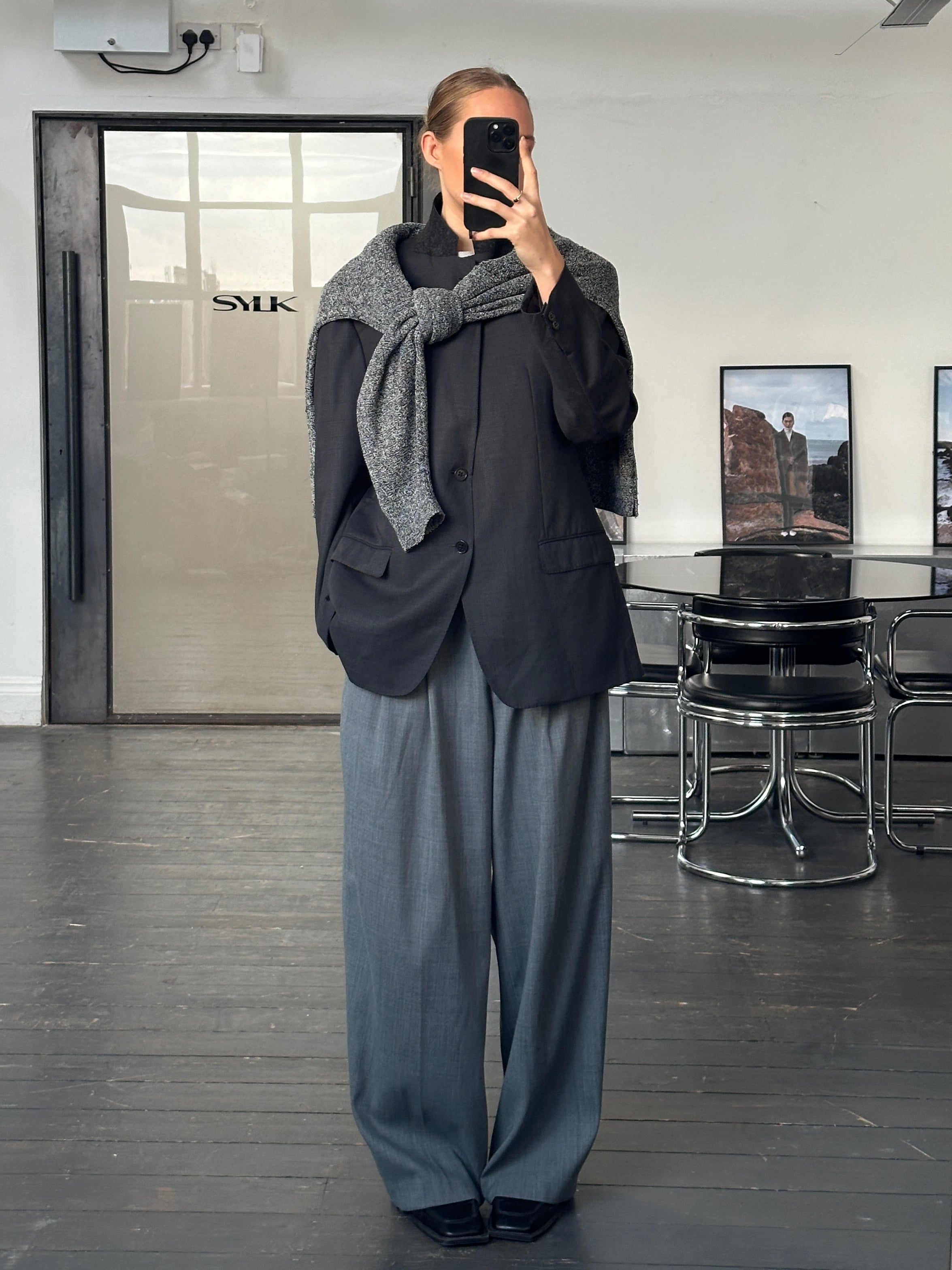 Armani Collezioni 2000s pure wool blazer in size 44R/XL, tailored fit, classic style, dark navy color, displayed on a hanger.