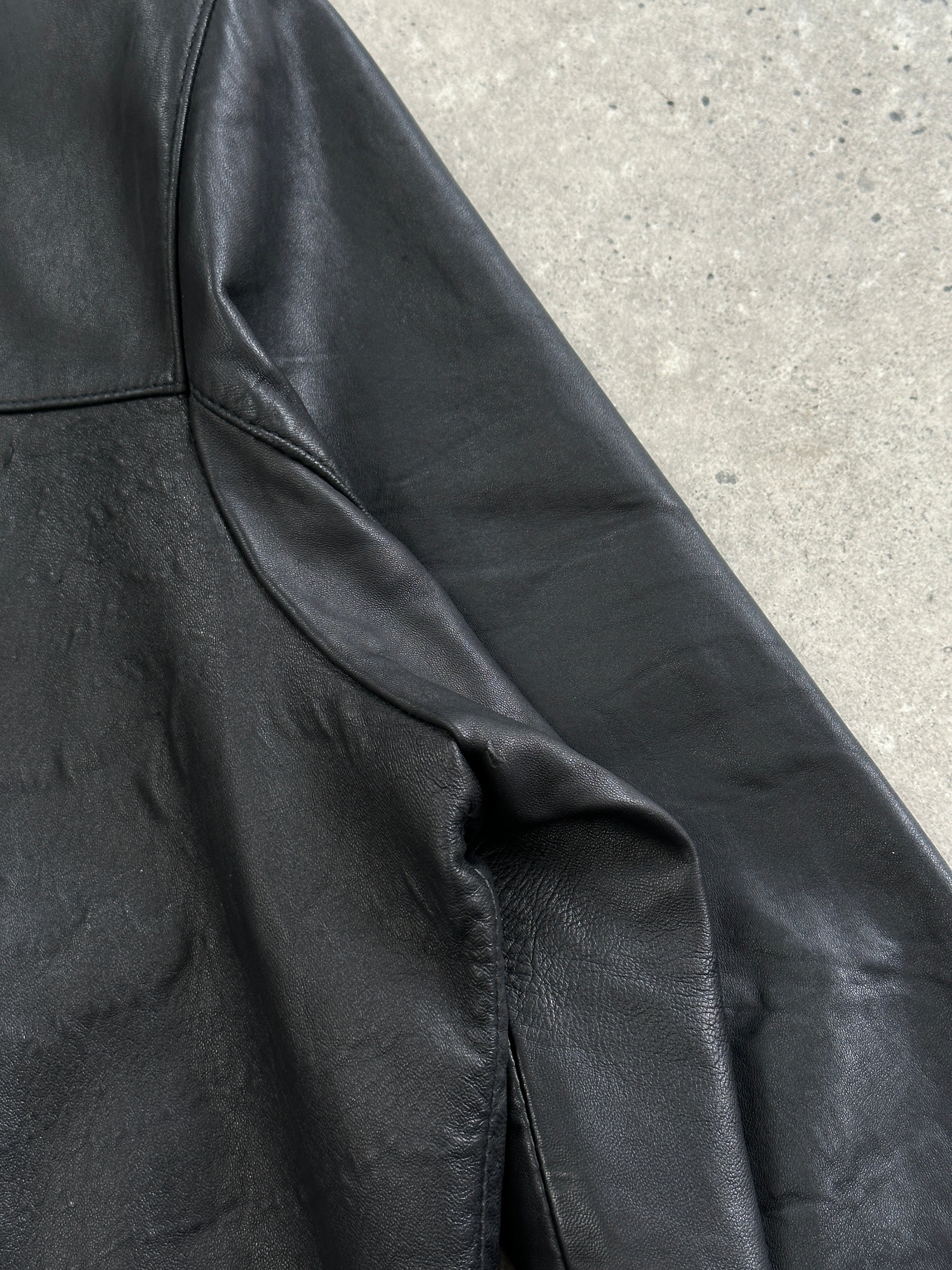 Balmain XL smooth black leather jacket with classic design, featuring sleek finish and structured fit.