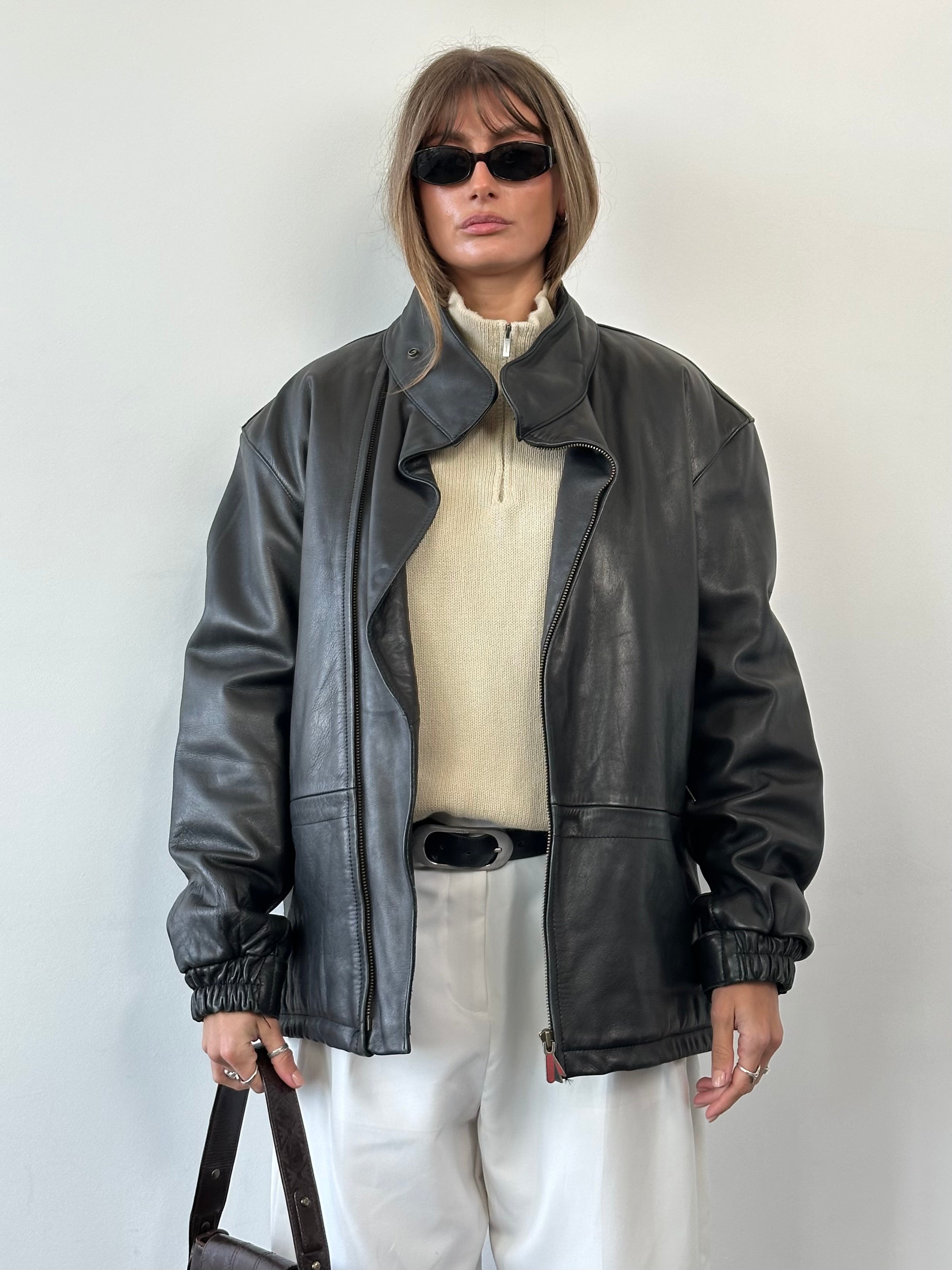Vintage high neck leather jacket in smooth leather, shown in size L/XL, featuring a classic design and structured fit.