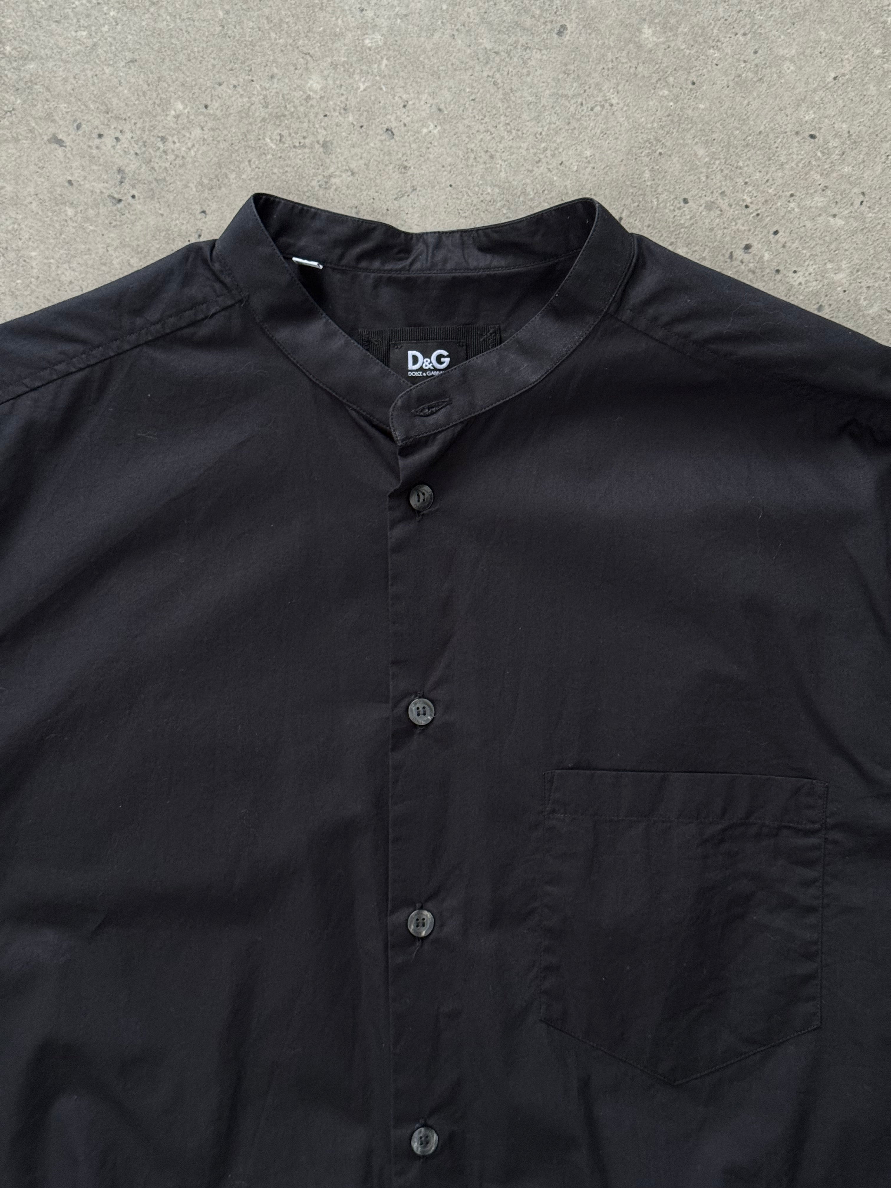 Dolce & Gabbana 2000s cotton collarless shirt in size M, featuring a sleek, minimalist design and classic white fabric.