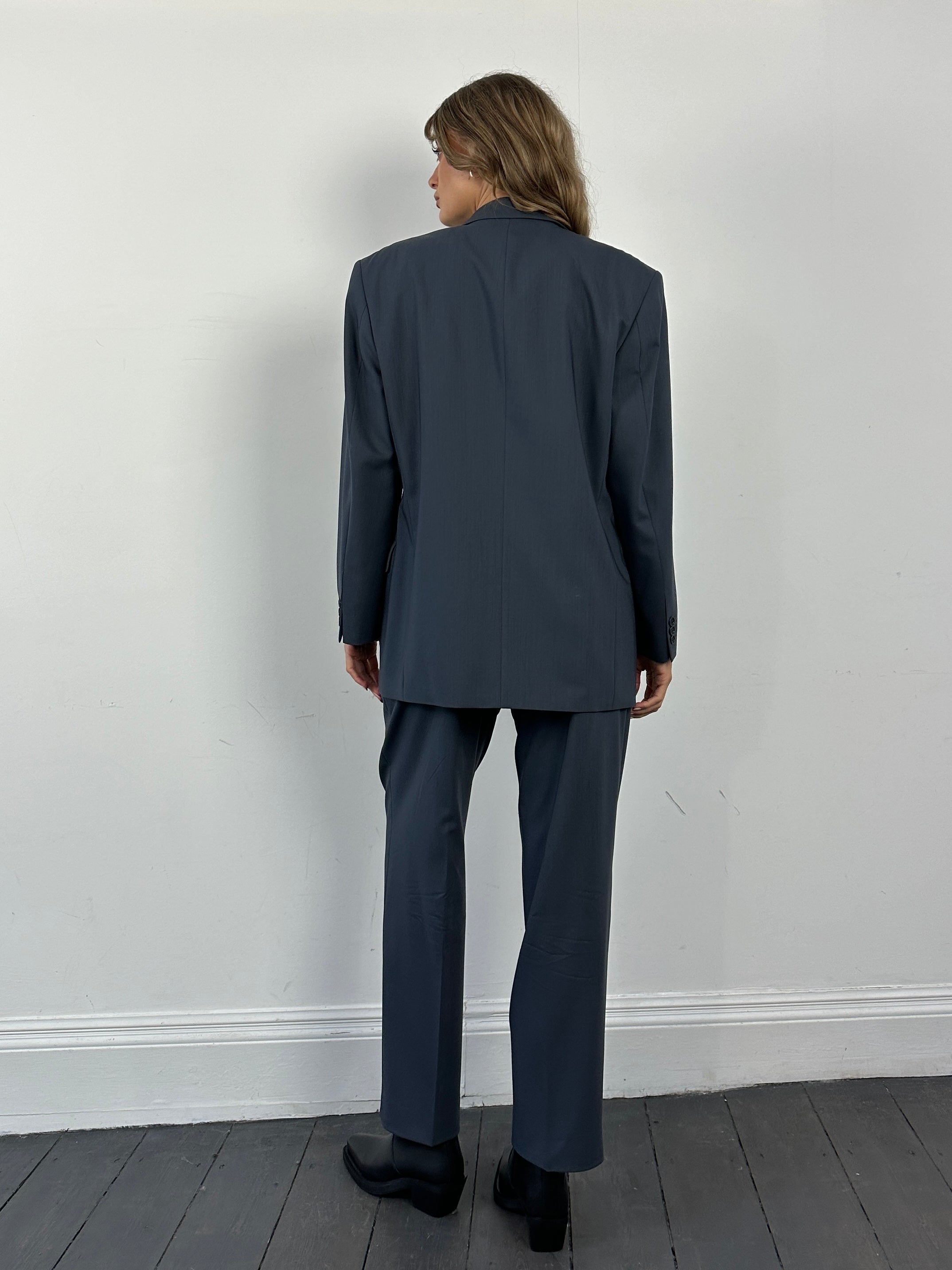 Balmain pure wool single-breasted suit jumpsuit in size 38S/W32, tailored fit with classic lapel and button closure.