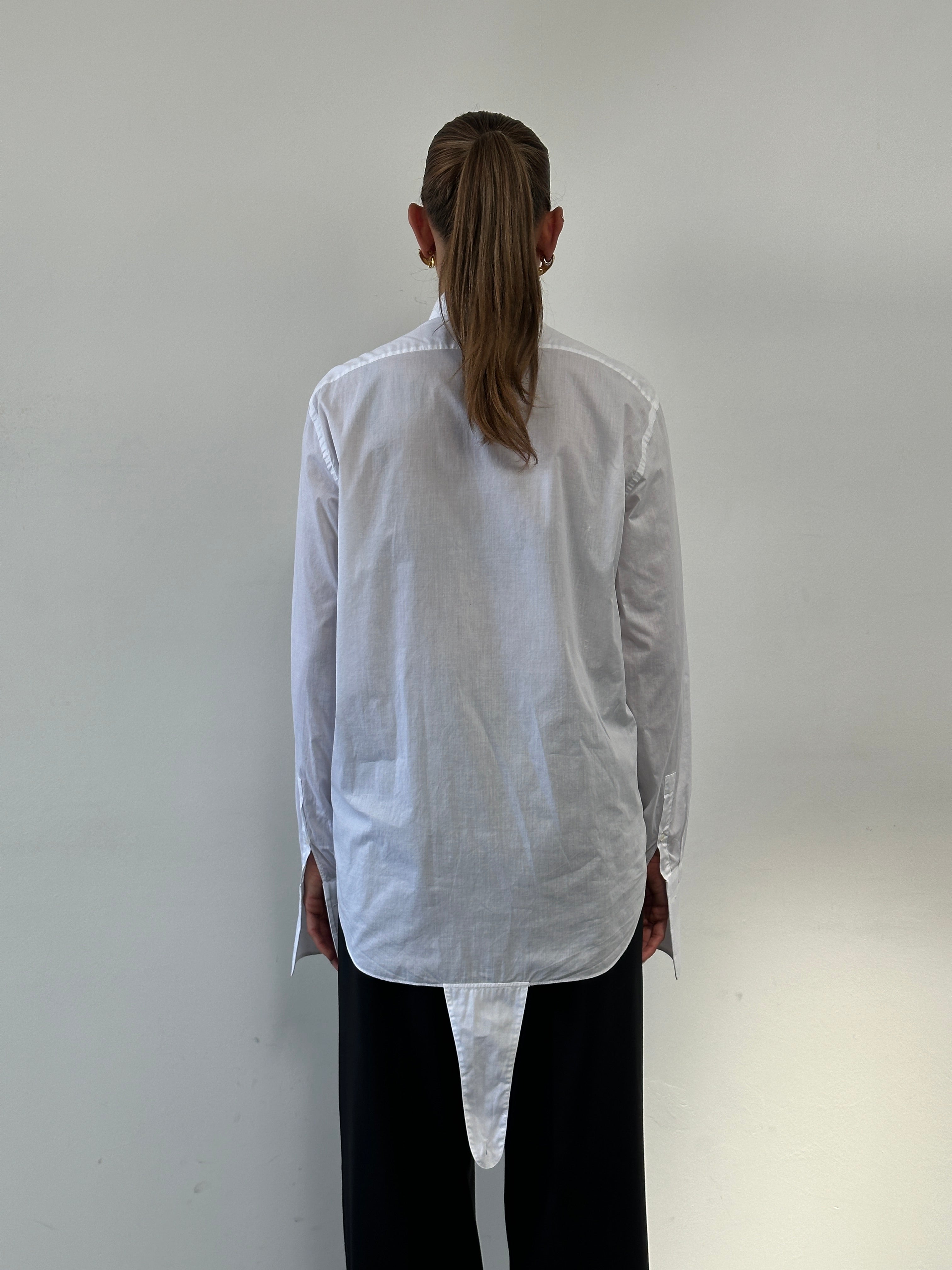 Vintage wing collar tuxedo dress shirt in size large, featuring classic design and crisp white fabric.