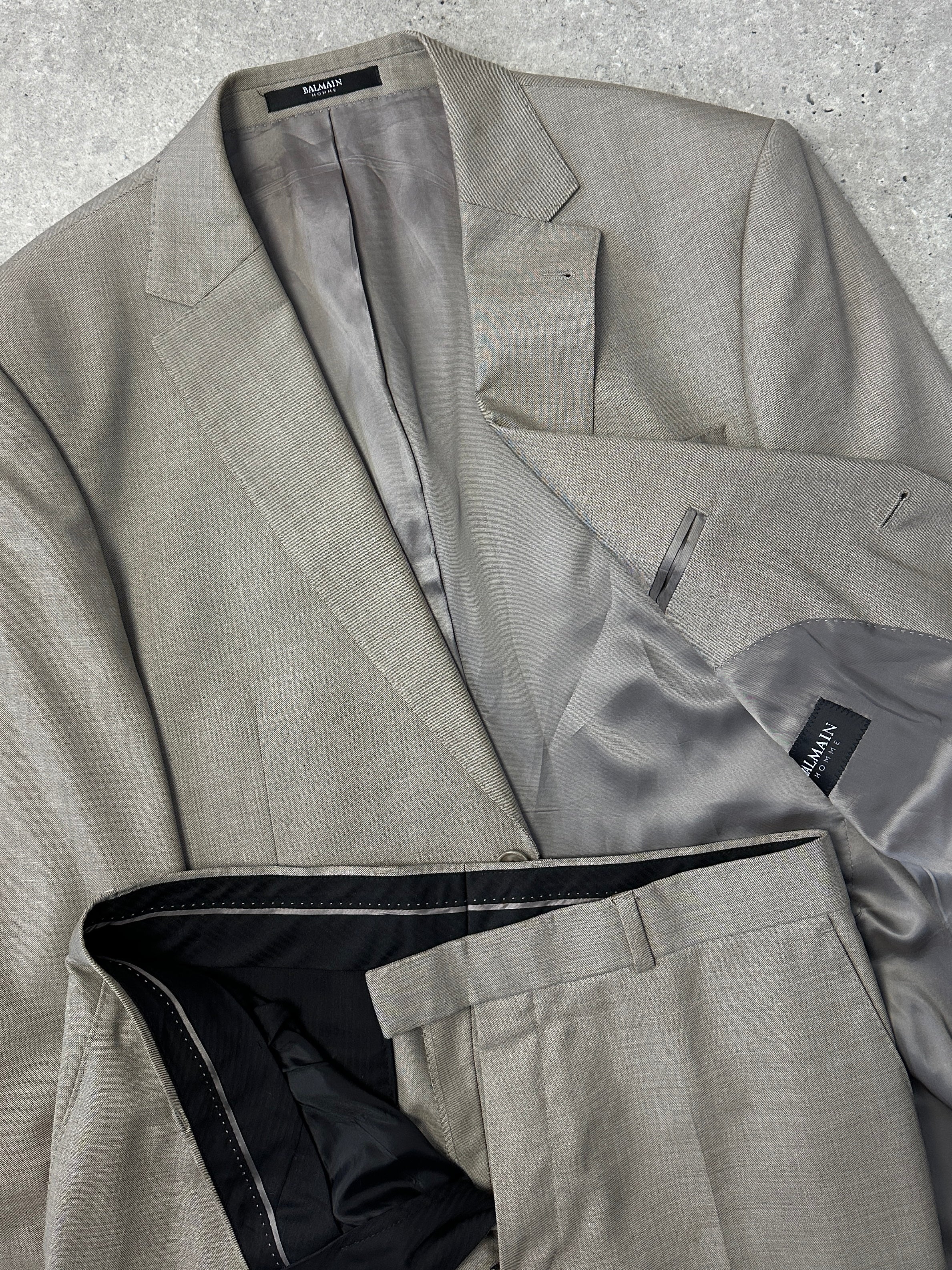 Balmain Homme wool silk single-breasted jumpsuit in size 42R/W34, featuring tailored fit and luxurious fabric.
