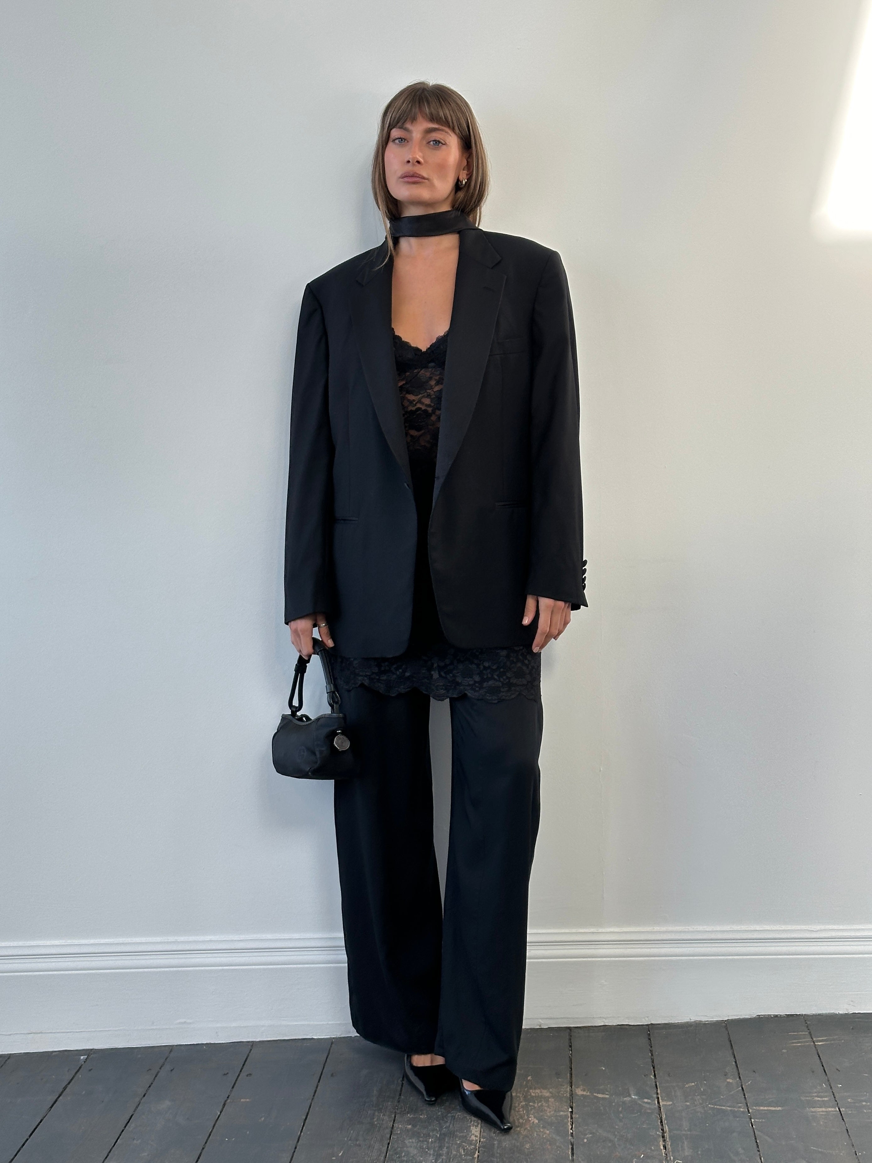 Christian Dior Monsieur 1980s wool tuxedo blazer in size 44R/XL, tailored fit, classic black with satin lapels, front button closure
