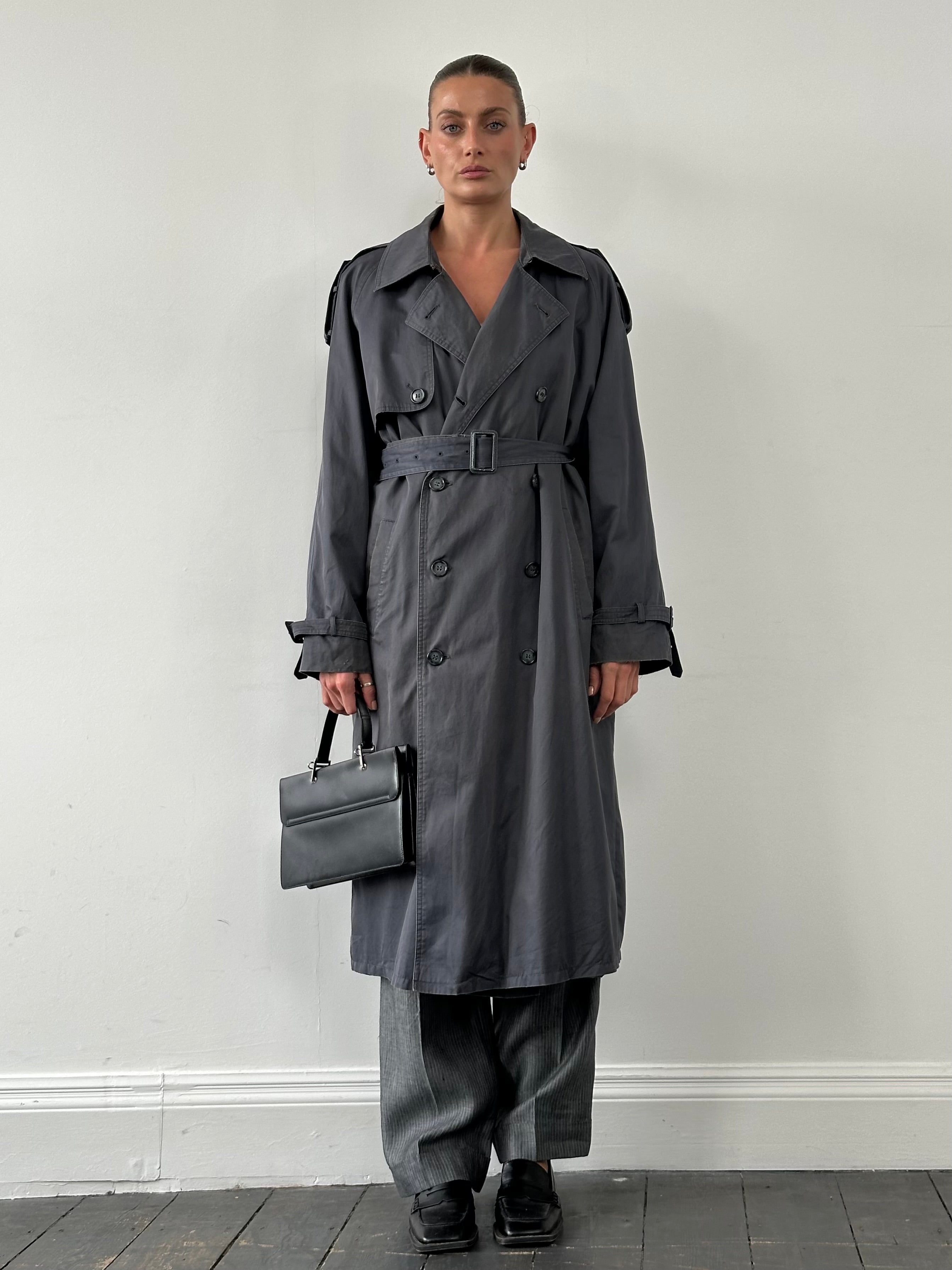 Yves Saint Laurent cotton double-breasted belted trench coat in XL, featuring classic design and stylish details.
